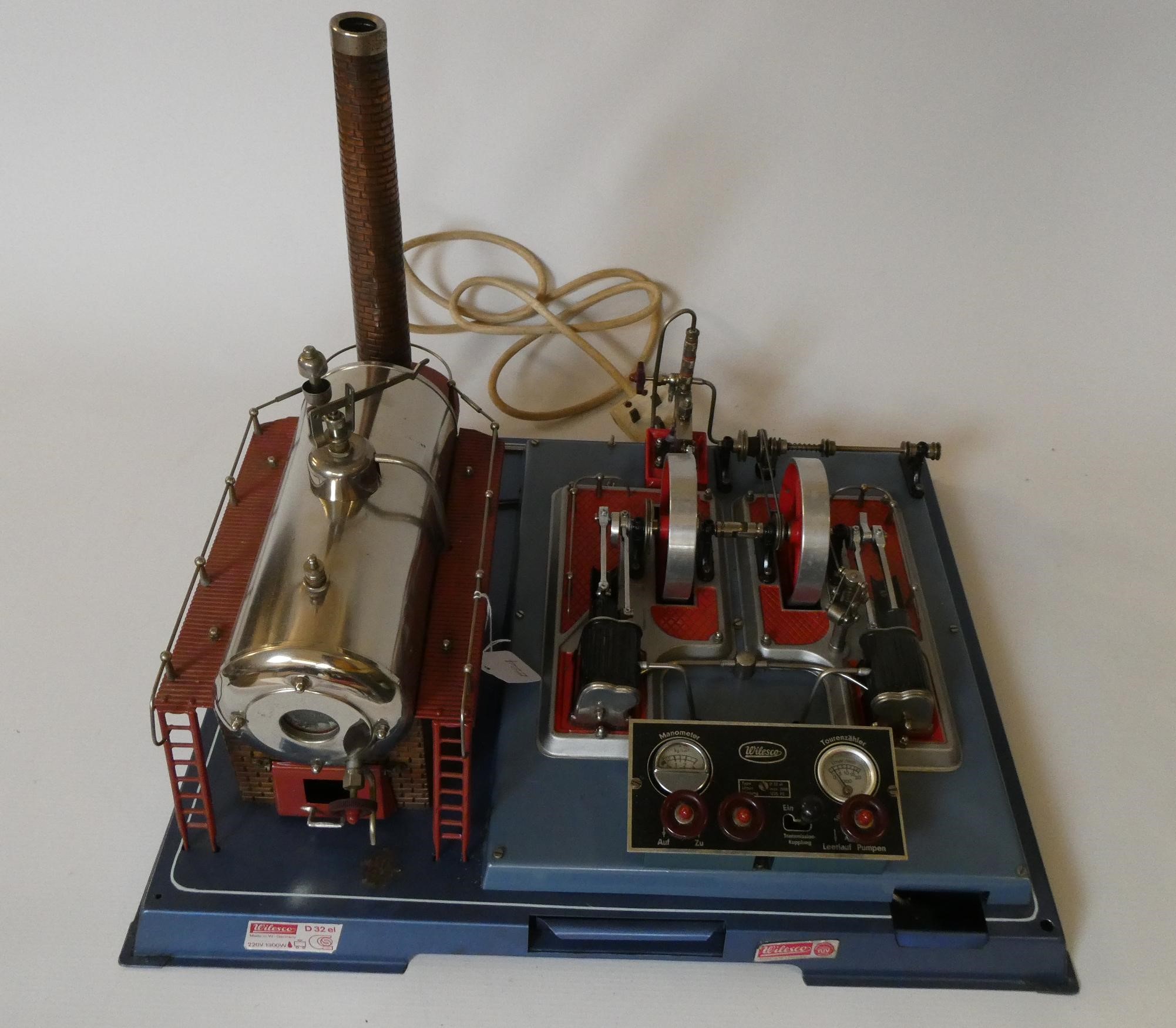 Wilesco D32 electrically fired twin cylinder stationary steam engine with dummy regulator and water Image