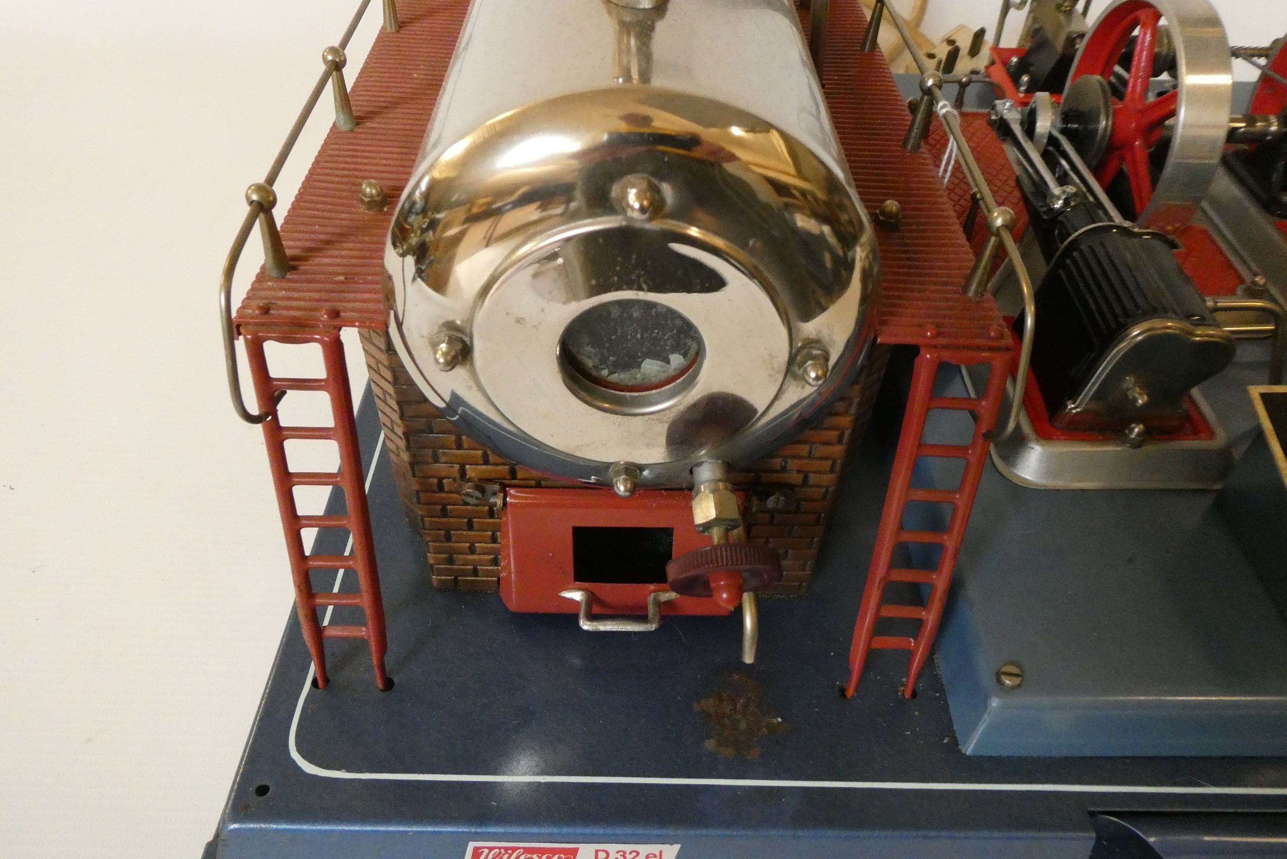 Wilesco D32 electrically fired twin cylinder stationary steam engine with dummy regulator and water Image