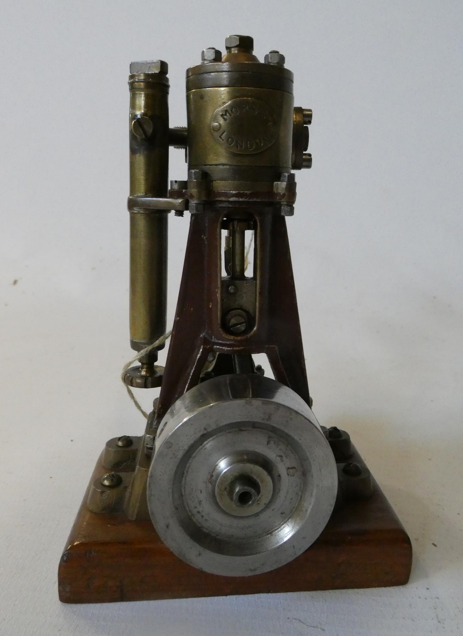 A single cylinder non reversing steam engine with maker's plate Moss of London, a very well-made Image