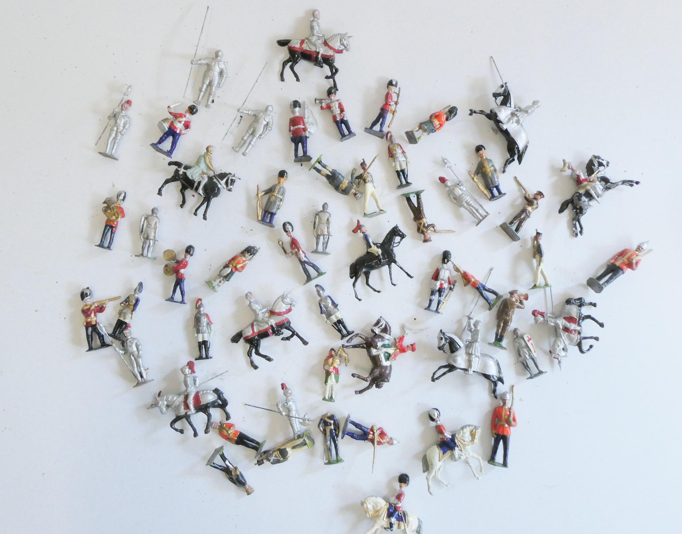 Lead military figures by Britains and others including guards and knights, fair to good (Est. plus Image
