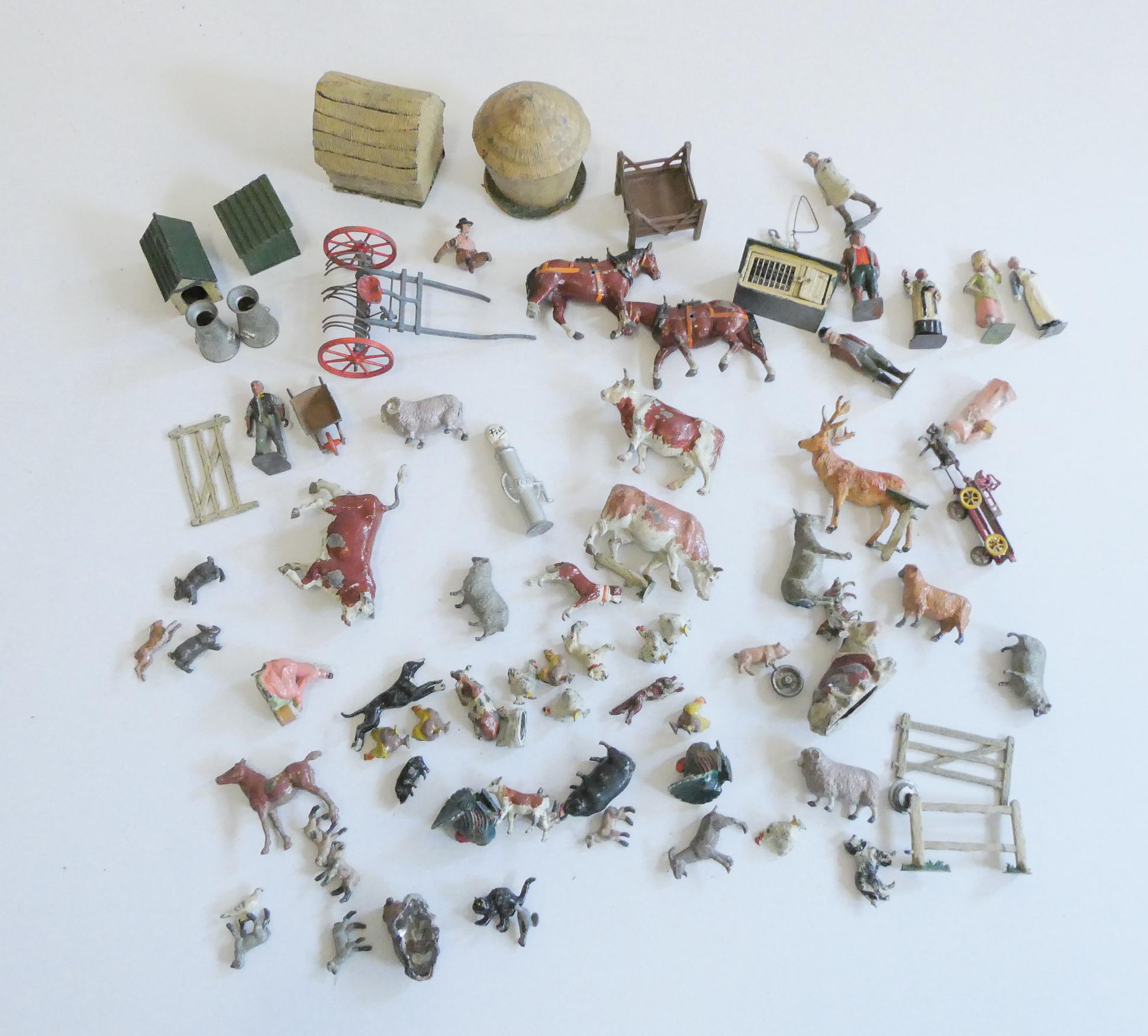 Lead farm animals, figures and equipment by Britains and others. Including cattle, sheep dogs and Image