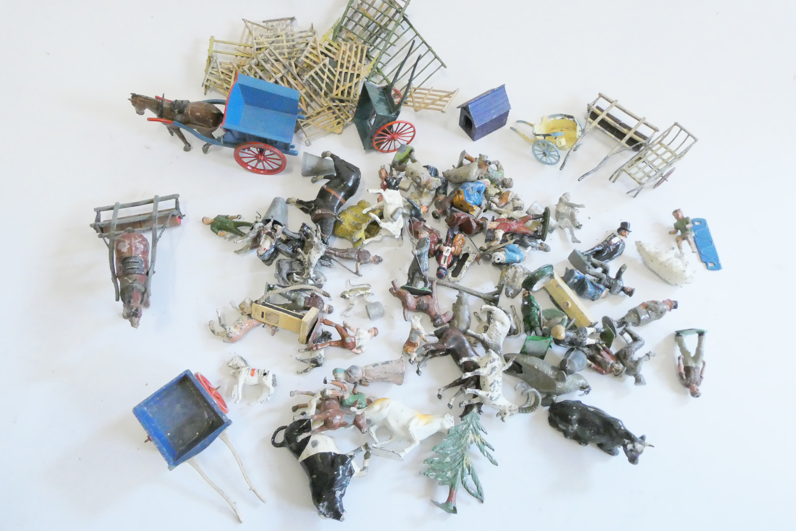 Farm animals and figures by Britains and others, Britains farm carts and fencing, some paint loss Image