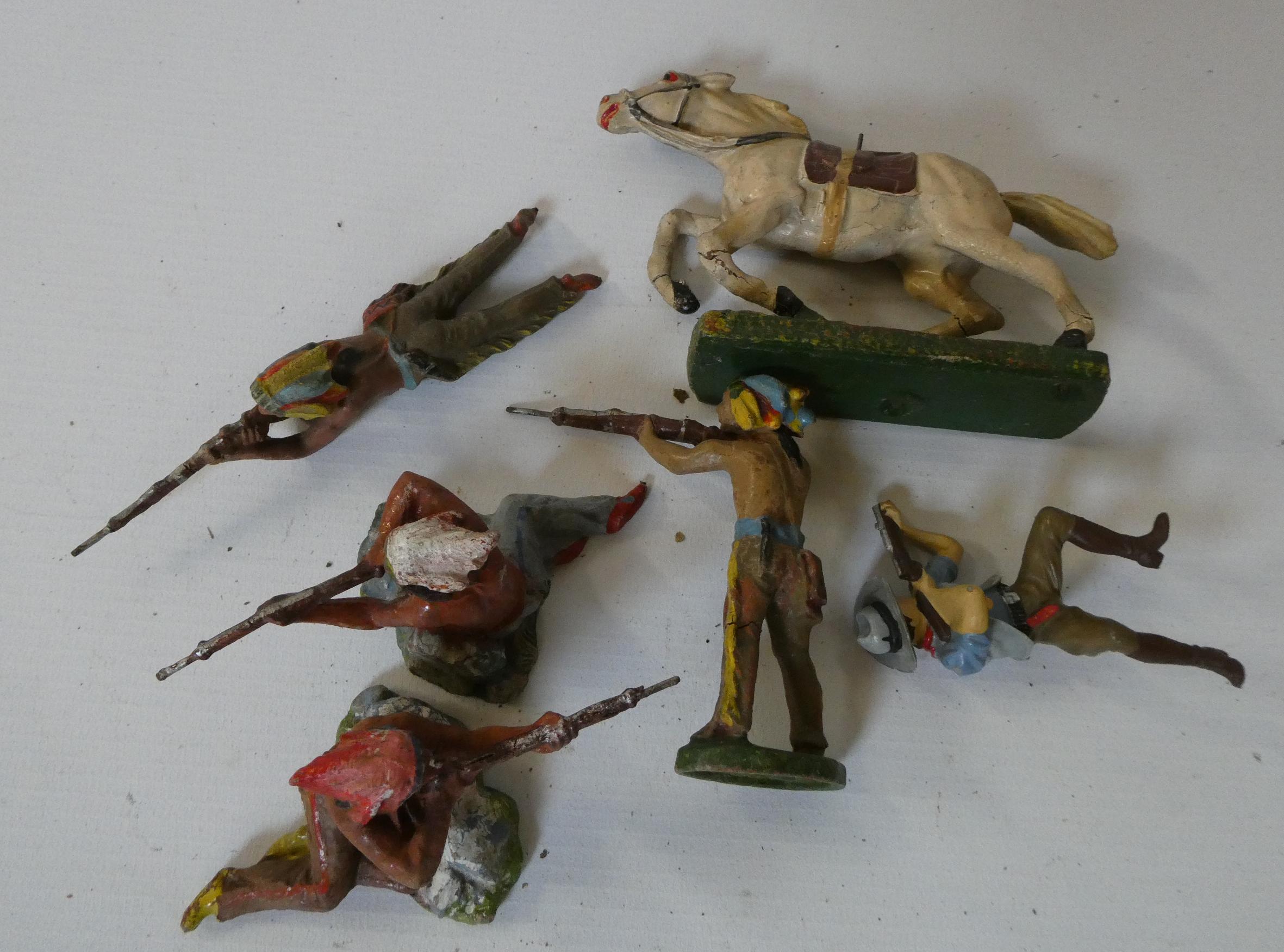 Four Elastolin Wild West figures comprising four Indians and horse with incorrect cowboy rider, good Image