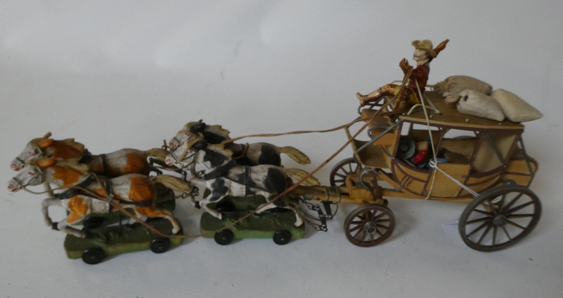 Late issue Elastolin stagecoach with four horses and driver and guard, minor damage to plastic roof Image