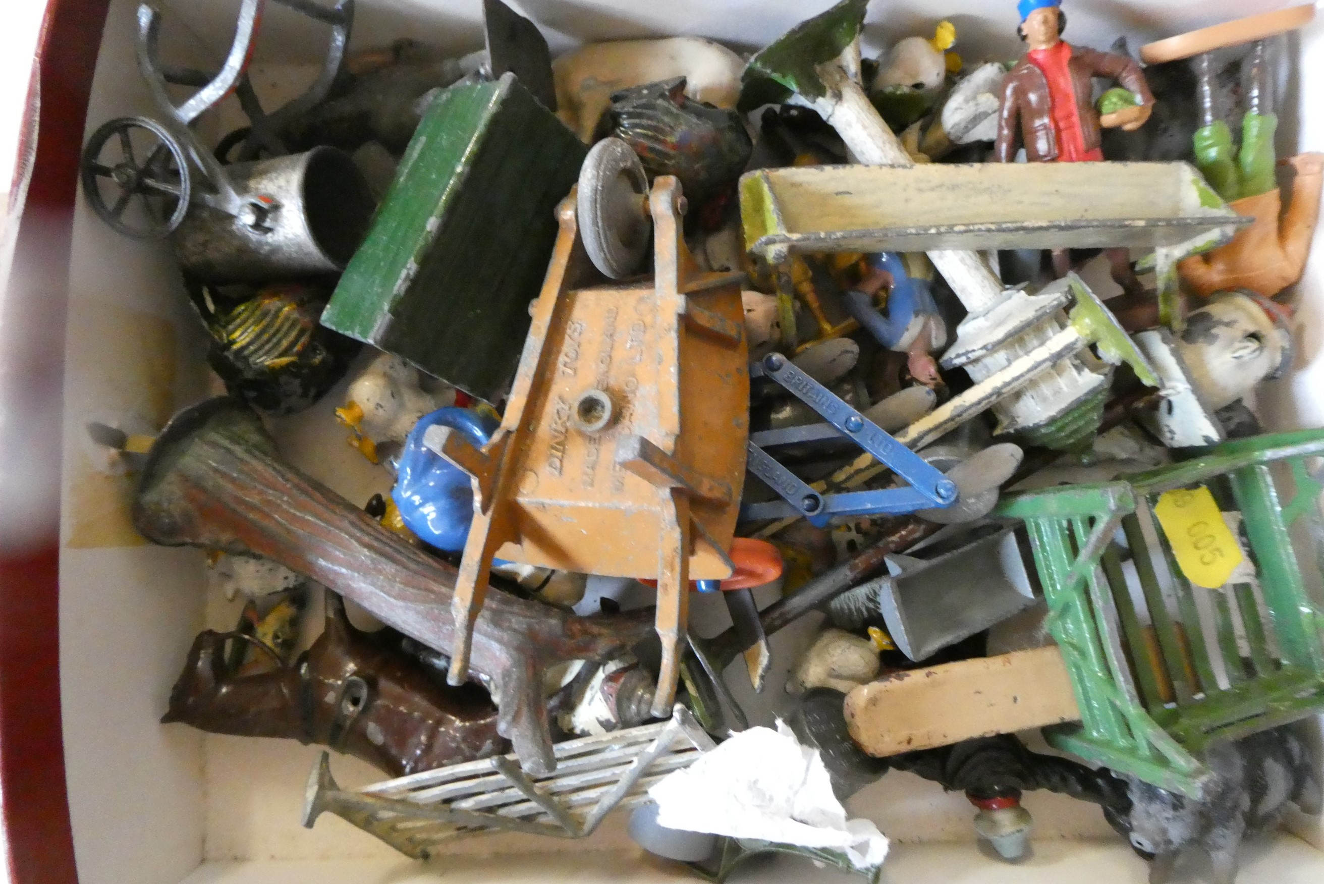 Playworn lead farm figures and equipment by Britains and other makers, most items have paint missing Image