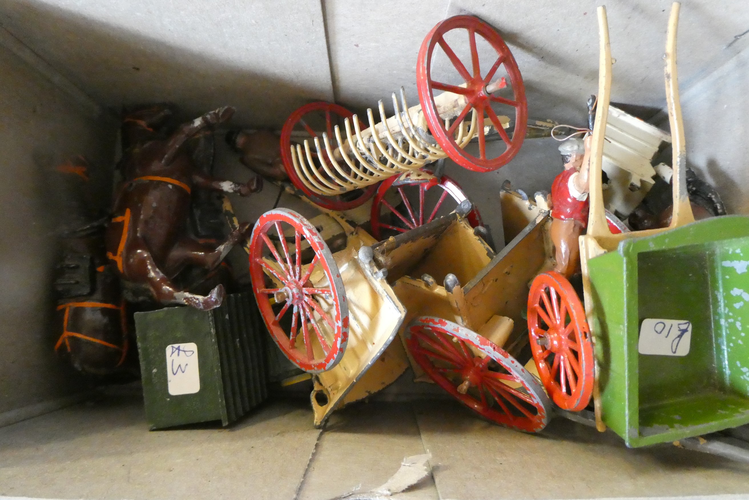 Playworn lead farm figures and equipment by Britains and other makers, most items have paint missing Image