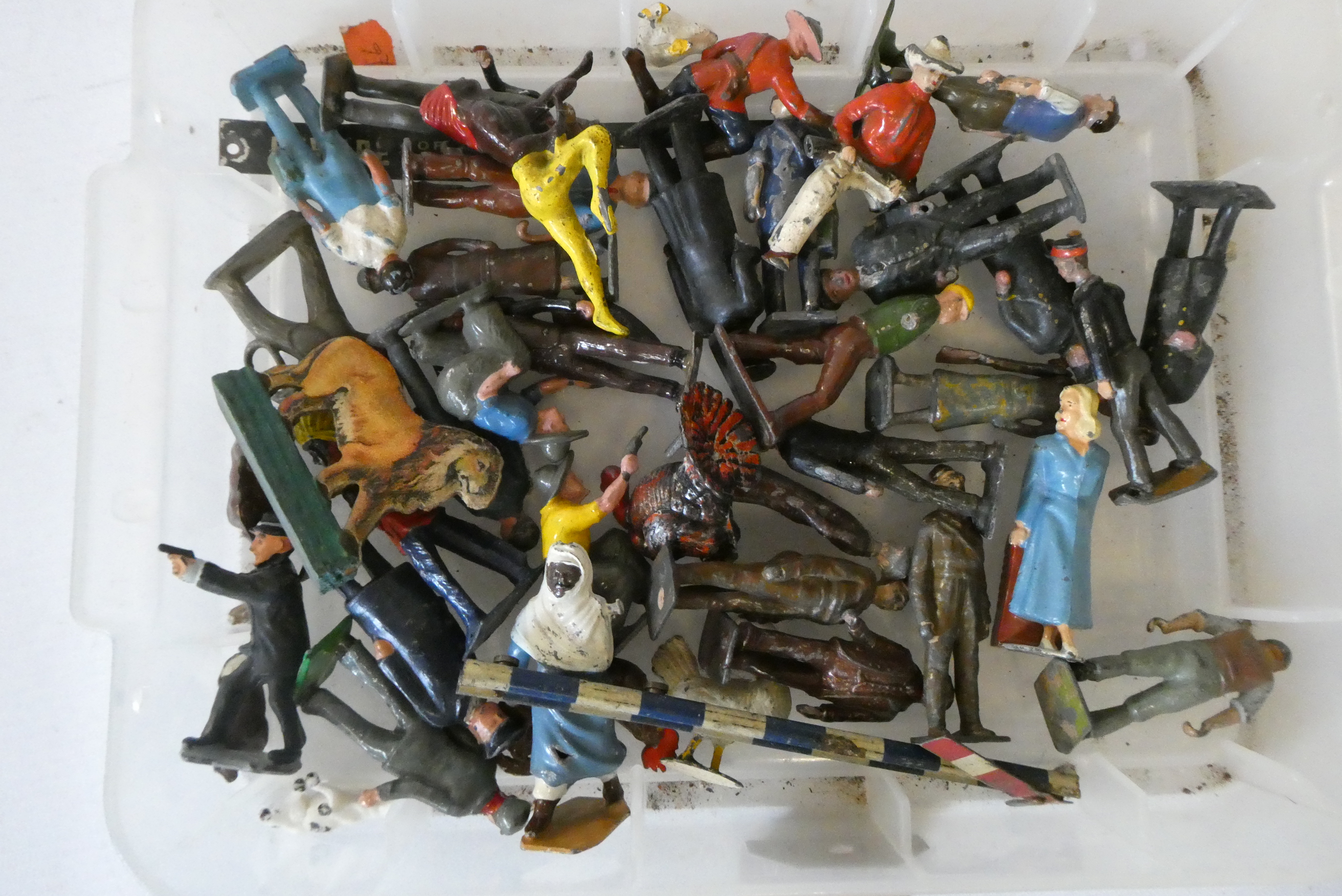 Figures by Timpo and others including station staff, cowboys and Indians, fair (Est. plus 24% Image