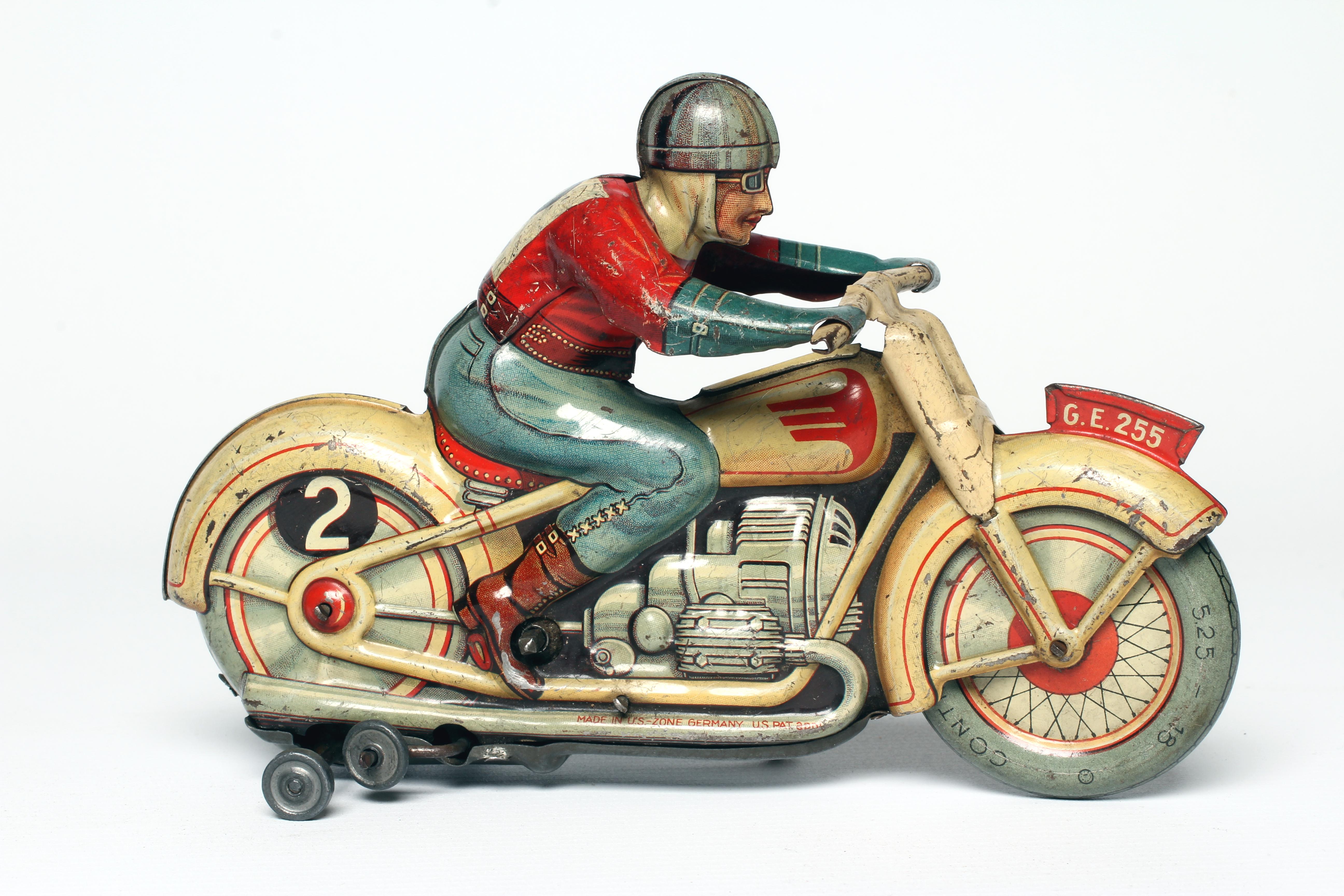 Technofix clockwork motorcycle and rider, some minor paint loss and scratches, clockwork motor Image