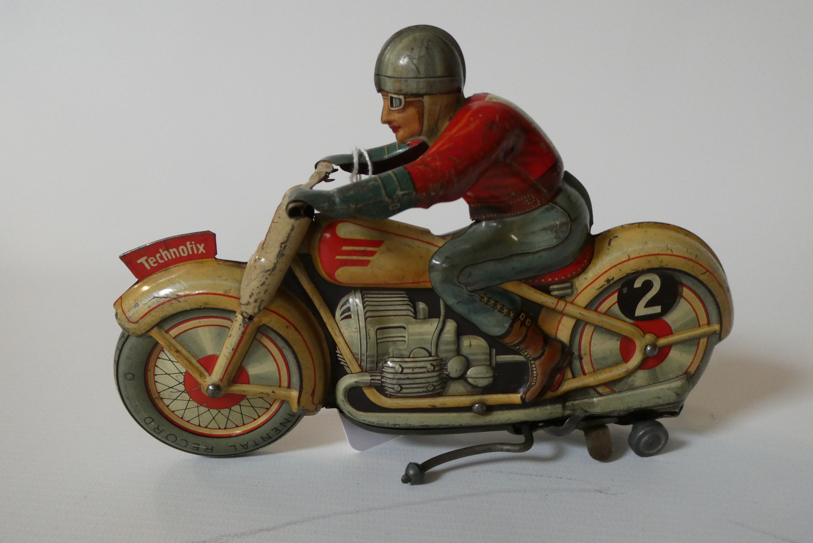 Technofix clockwork motorcycle and rider, some minor paint loss and scratches, clockwork motor Image