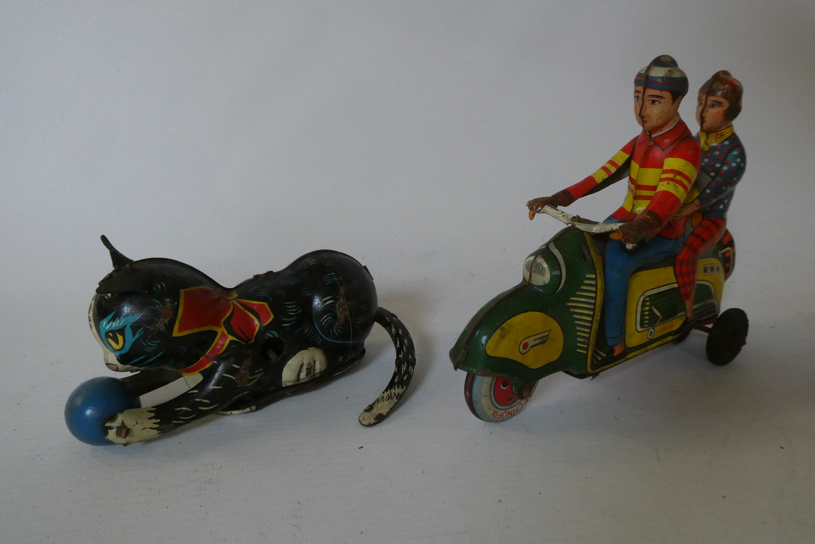 Technofix friction powered scooter with driver and passenger Image