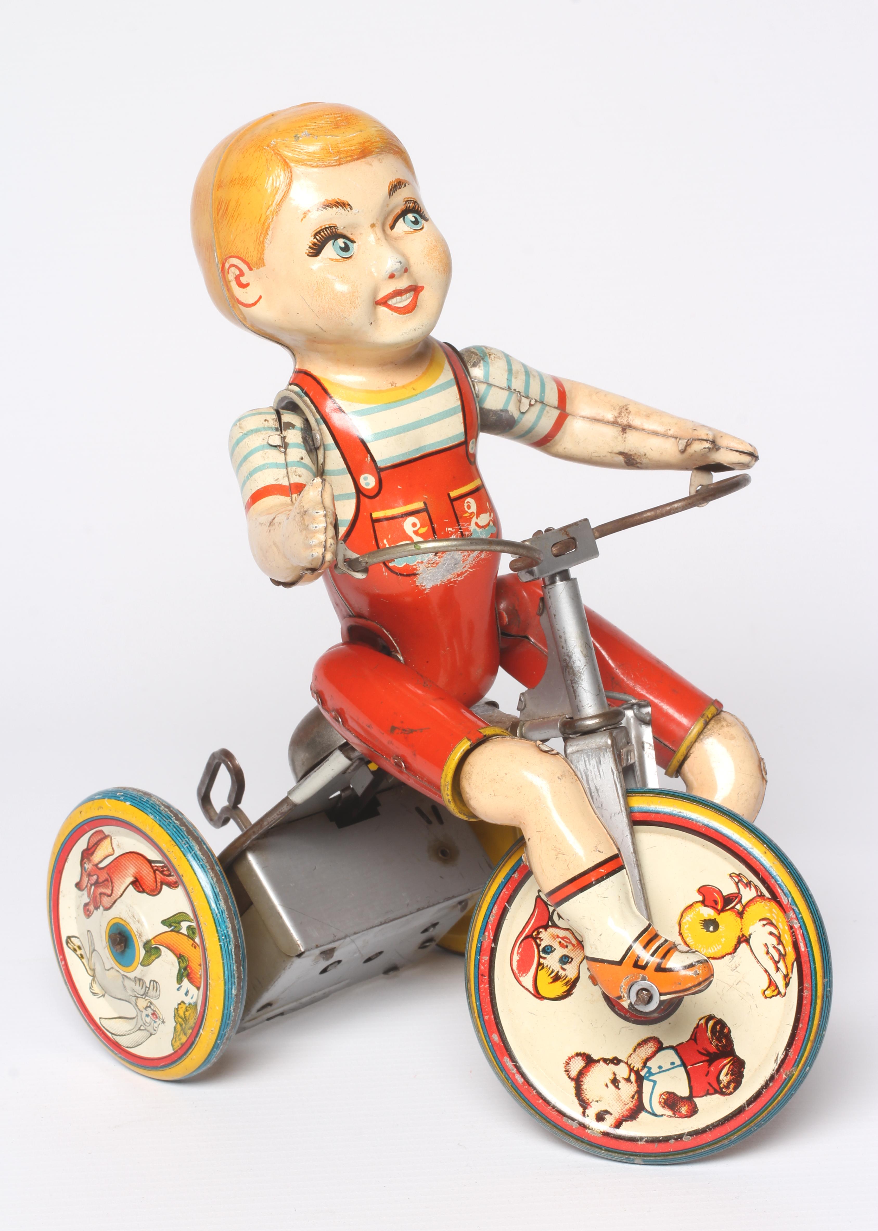 Unique Art clockwork Kiddy Cyclist, some paint loss, fair (Est. plus 24% premium inc. VAT) Image