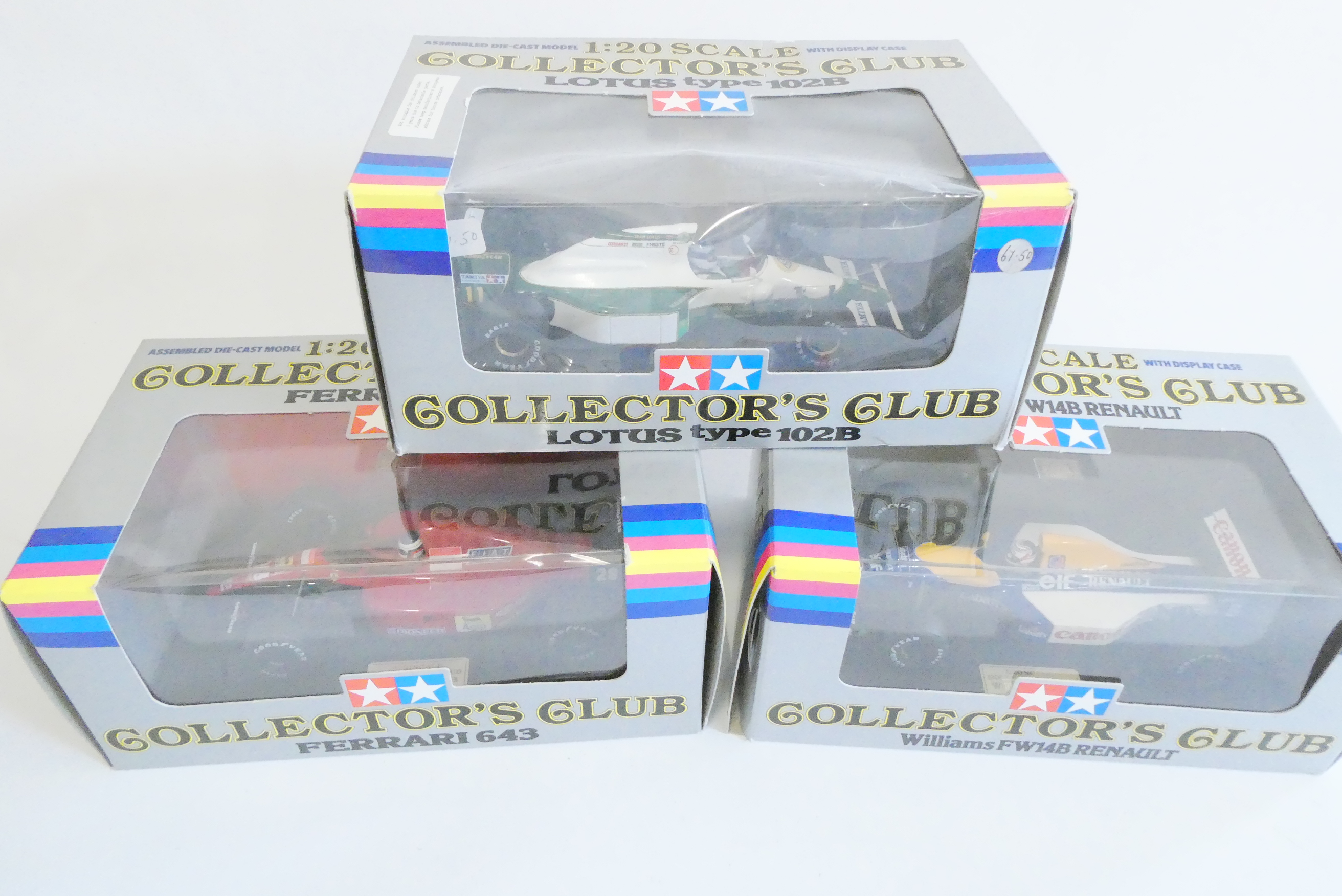Three Tamiya Collectors Club race cars comprising Williams FW14B, Ferrari 643 and Lotus type 102B, Image