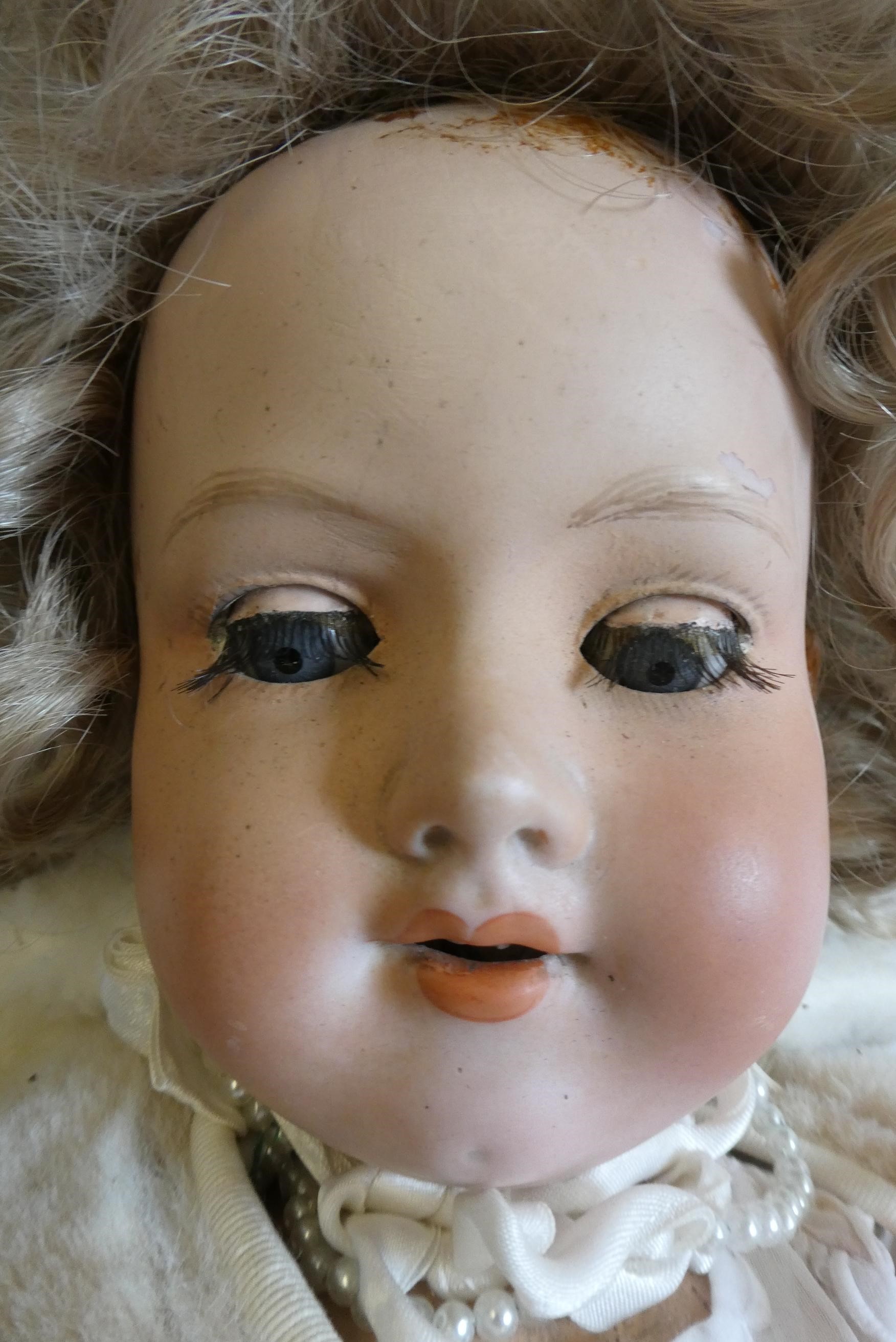Three vintage dolls Image