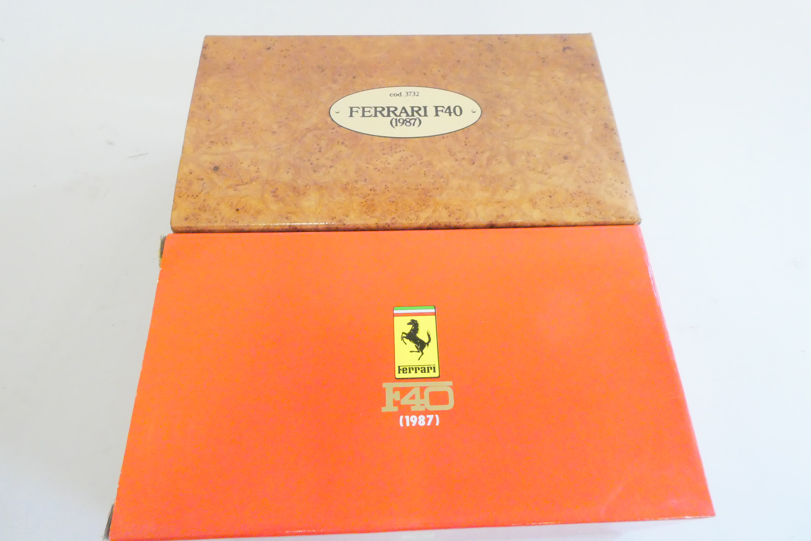 Two Burago Ferrari F40 cars, both items boxed, good to excellent (Est. plus 24% premium inc. VAT) Image
