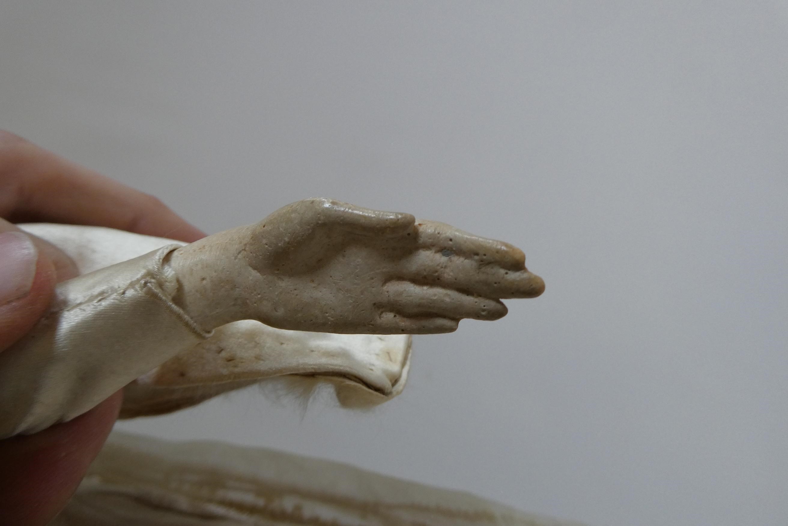 A high quality Victorian wax shoulder head doll with brown glass fixed eyes Image