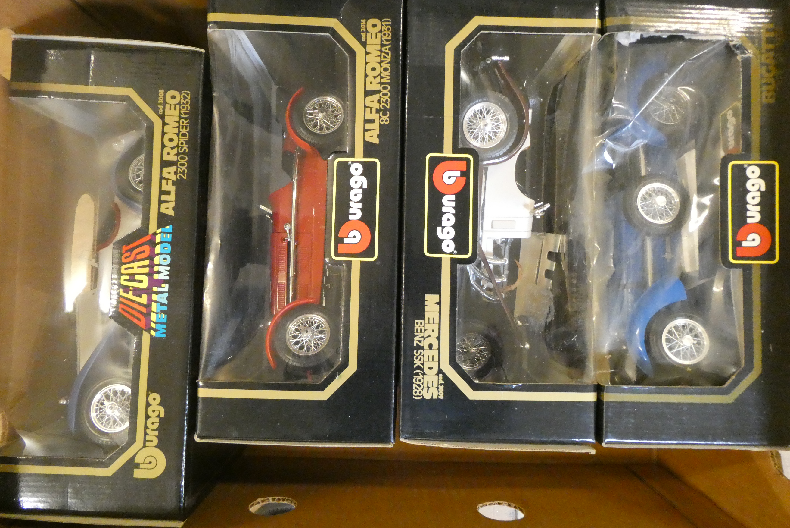 Four 1/18 scale classic cars by Burago including Bugatti Alfa Romeo and Mercedes, all items boxed Image