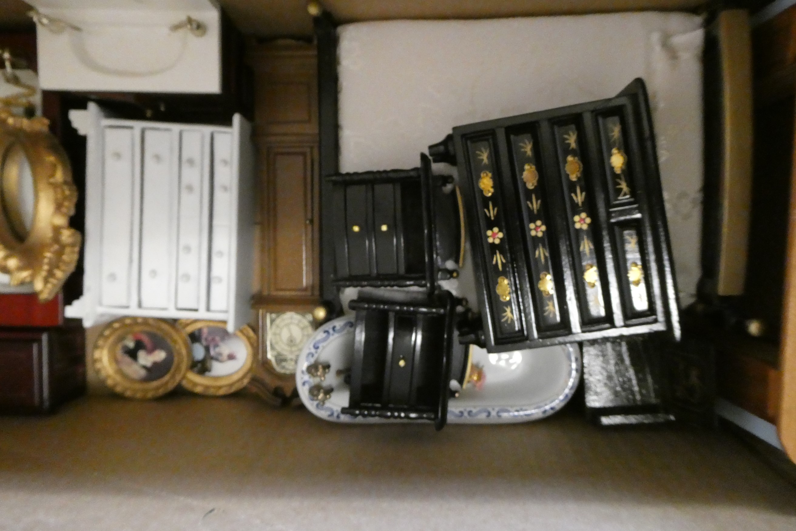 Four boxes of doll's house furniture and accessories Image