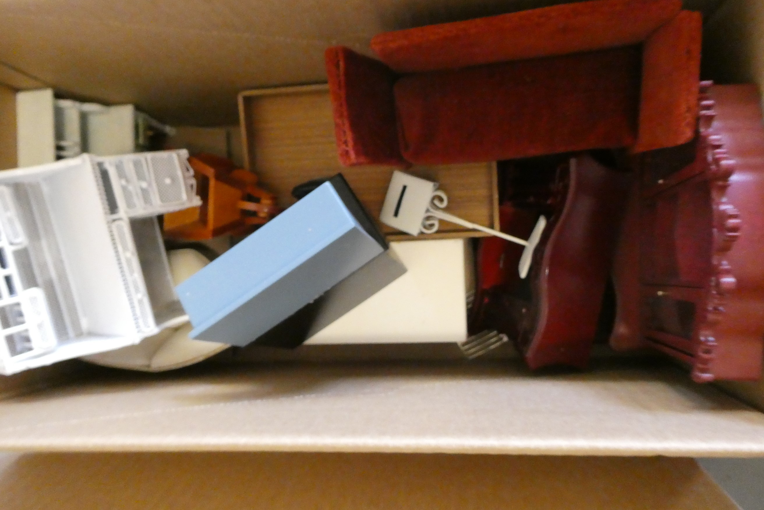 Four boxes of doll's house furniture and accessories Image