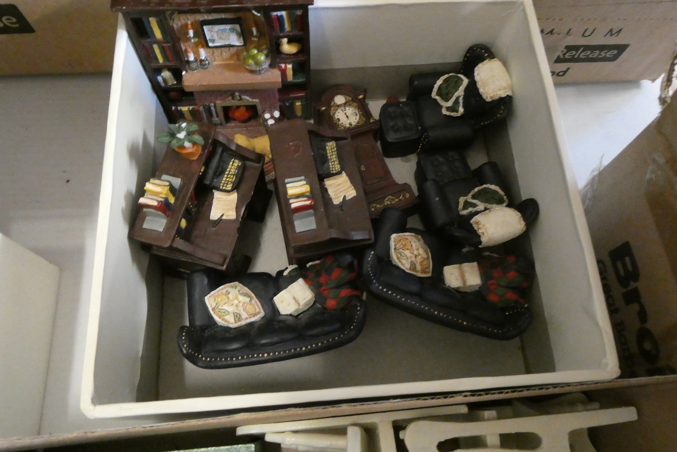 Four boxes of doll's house furniture and accessories Image