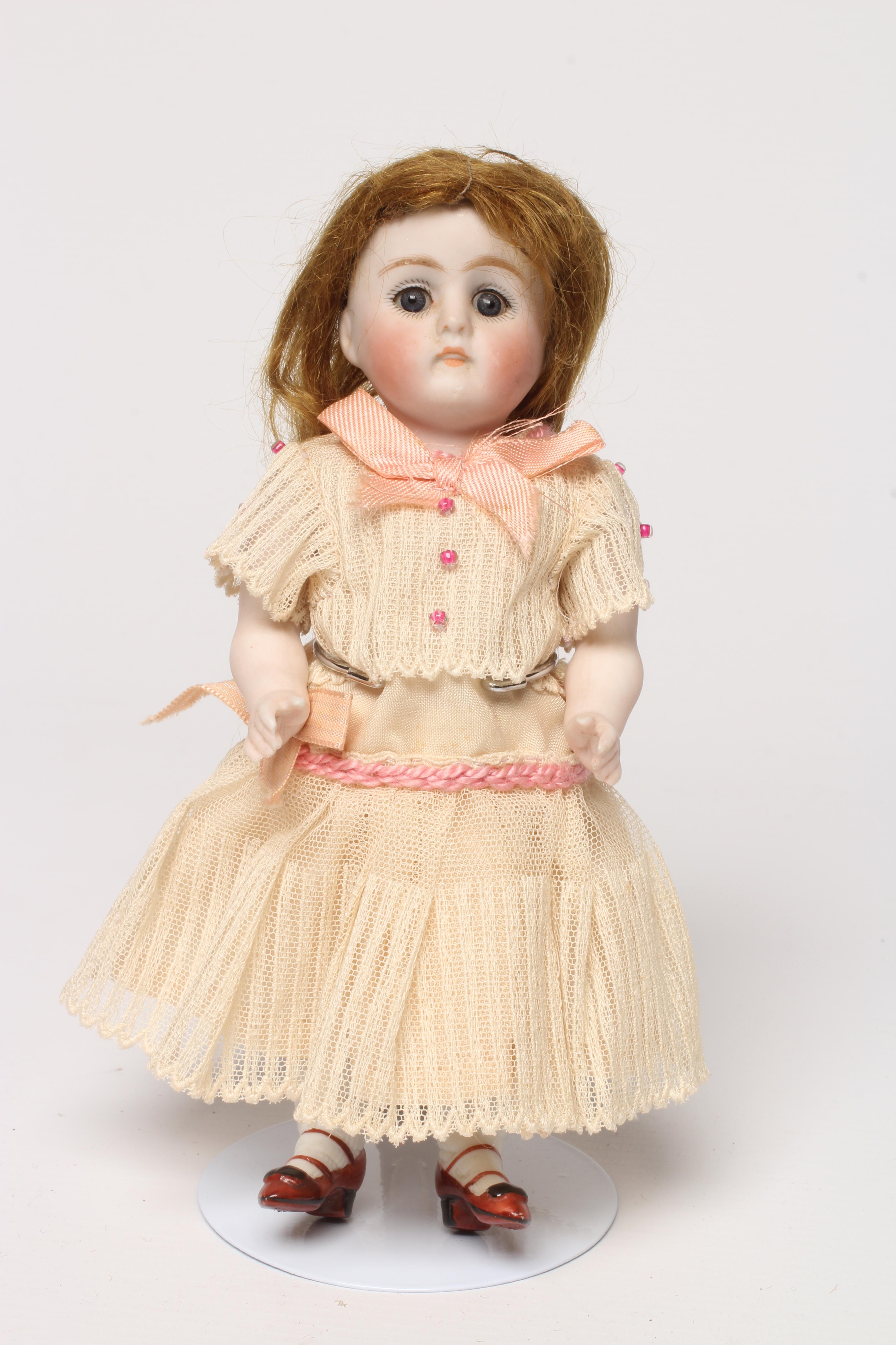 A mignonette all bisque doll Image