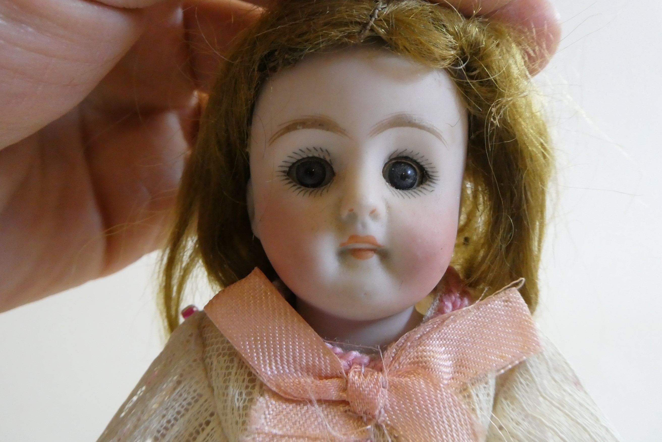 A mignonette all bisque doll Image