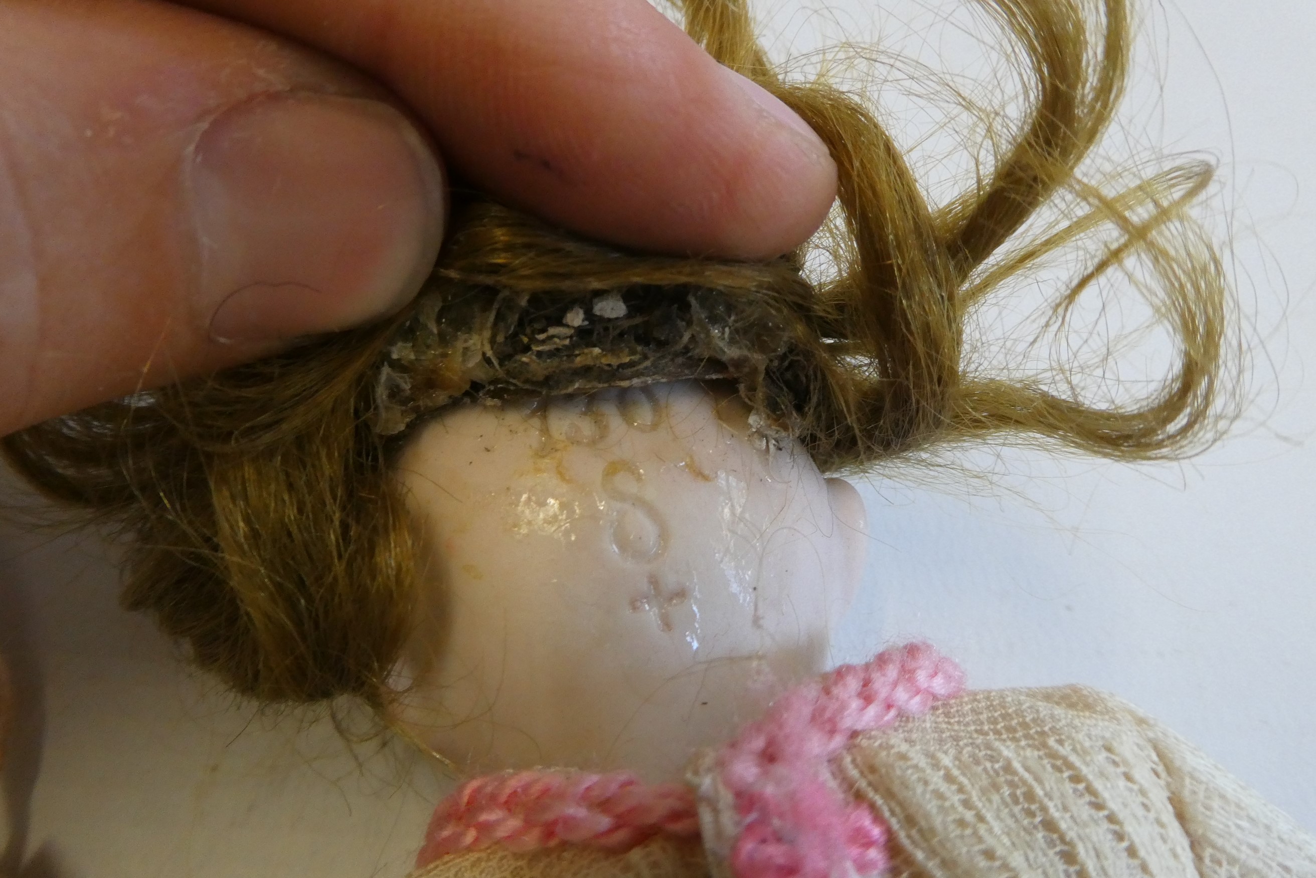 A mignonette all bisque doll Image