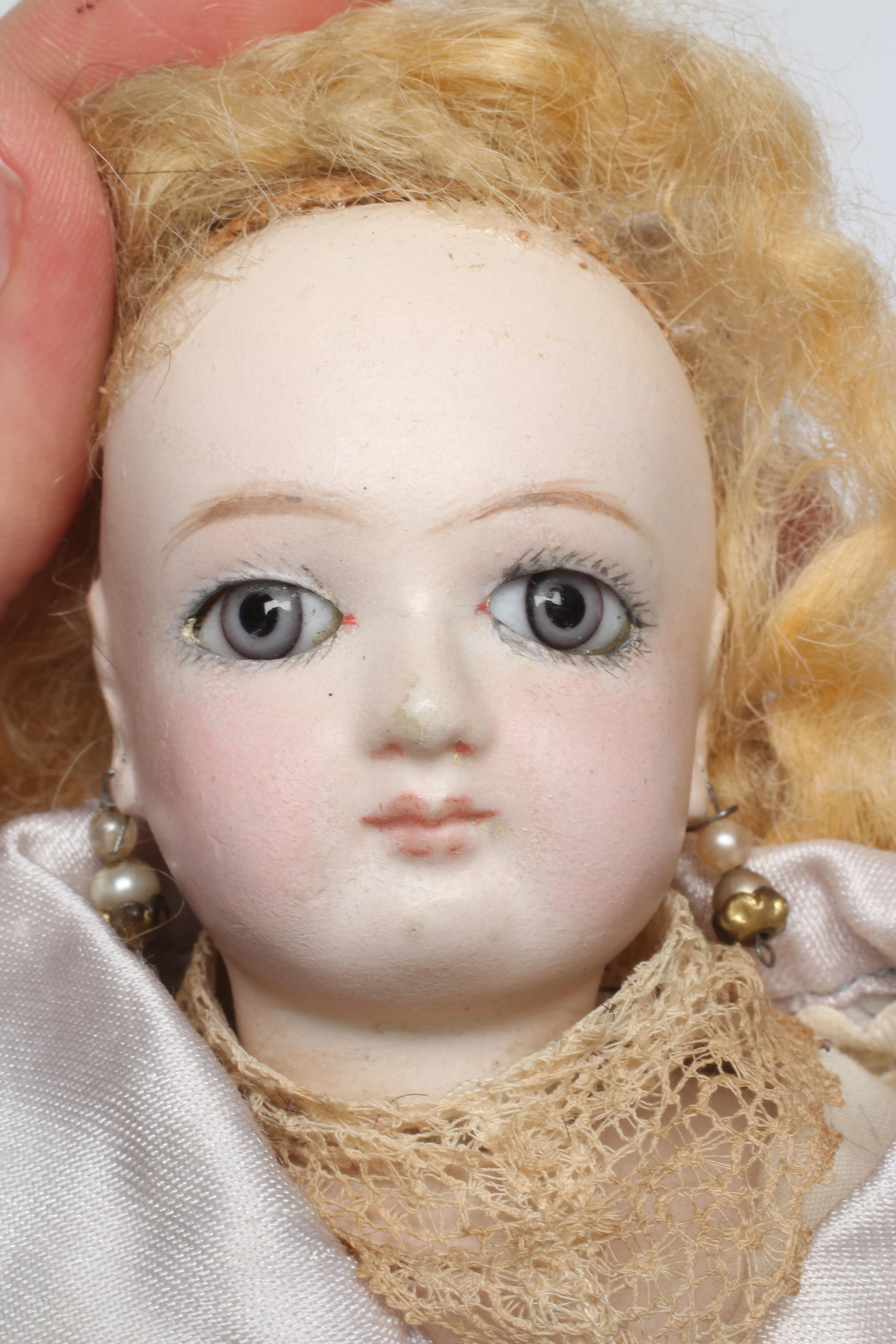 A French bisque swivel neck shoulder head fashion doll Image