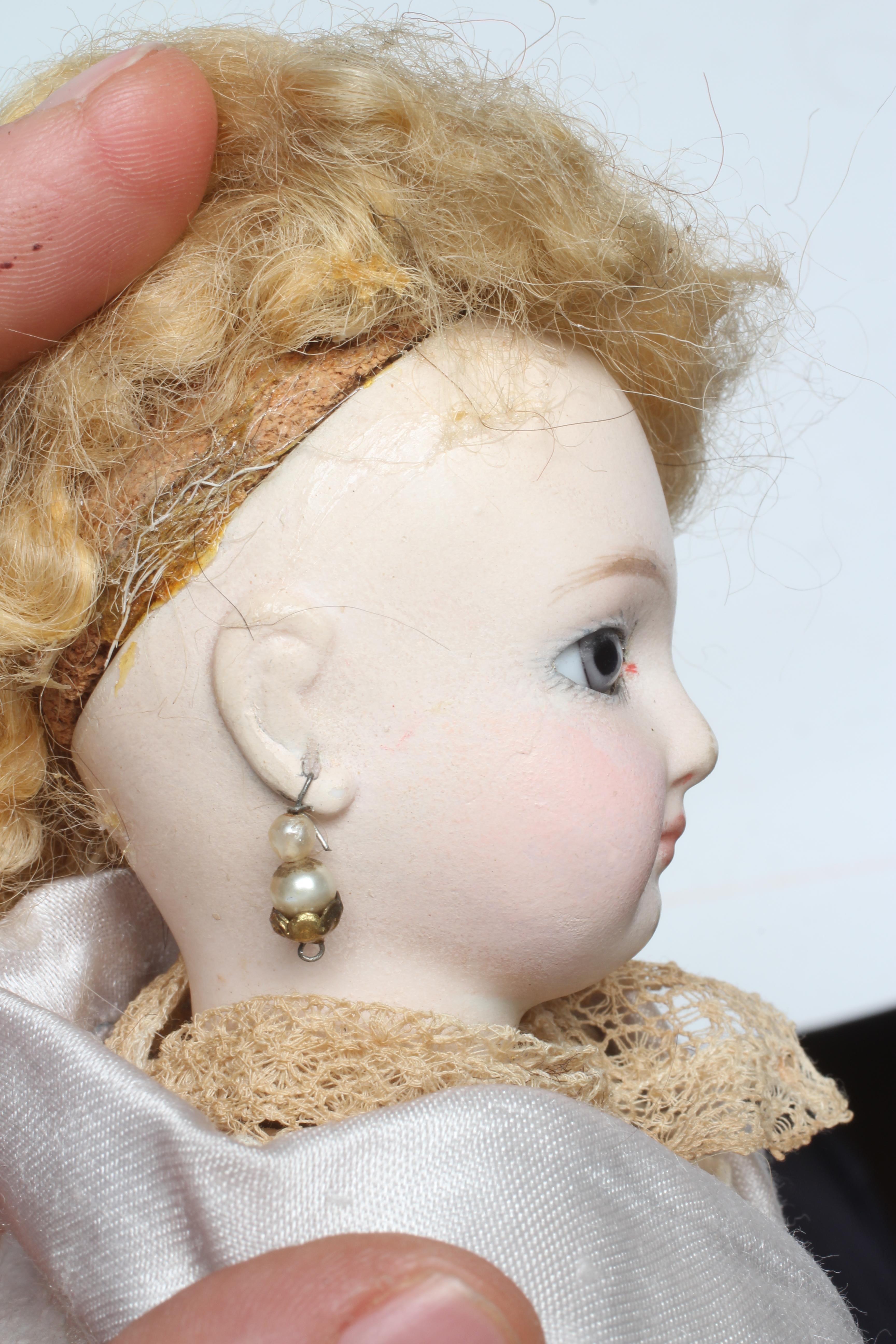 A French bisque swivel neck shoulder head fashion doll Image