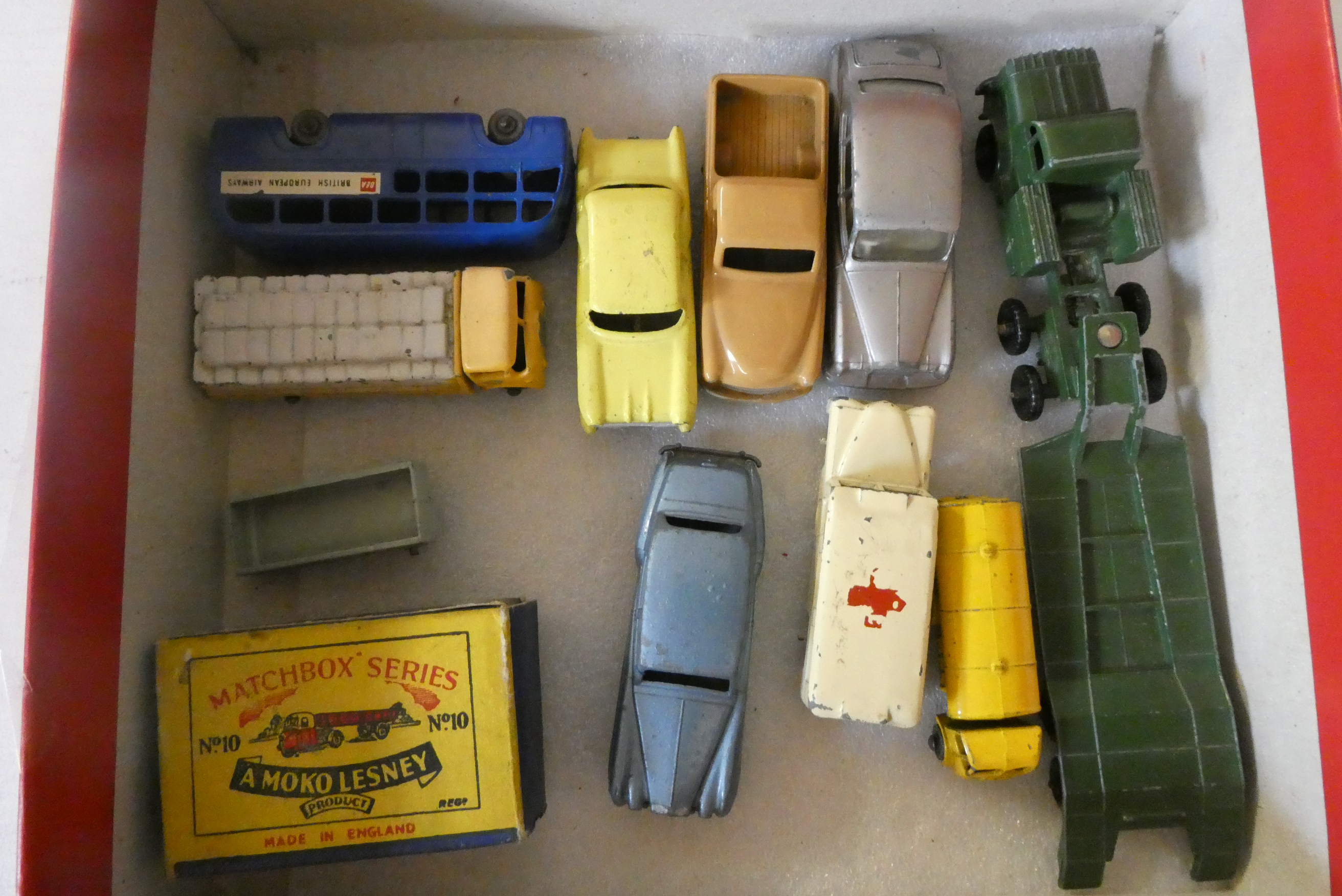 Ten unboxed Matchbox vehicles including tank transporter, Rolls Royce and cement lorry, models fair Image