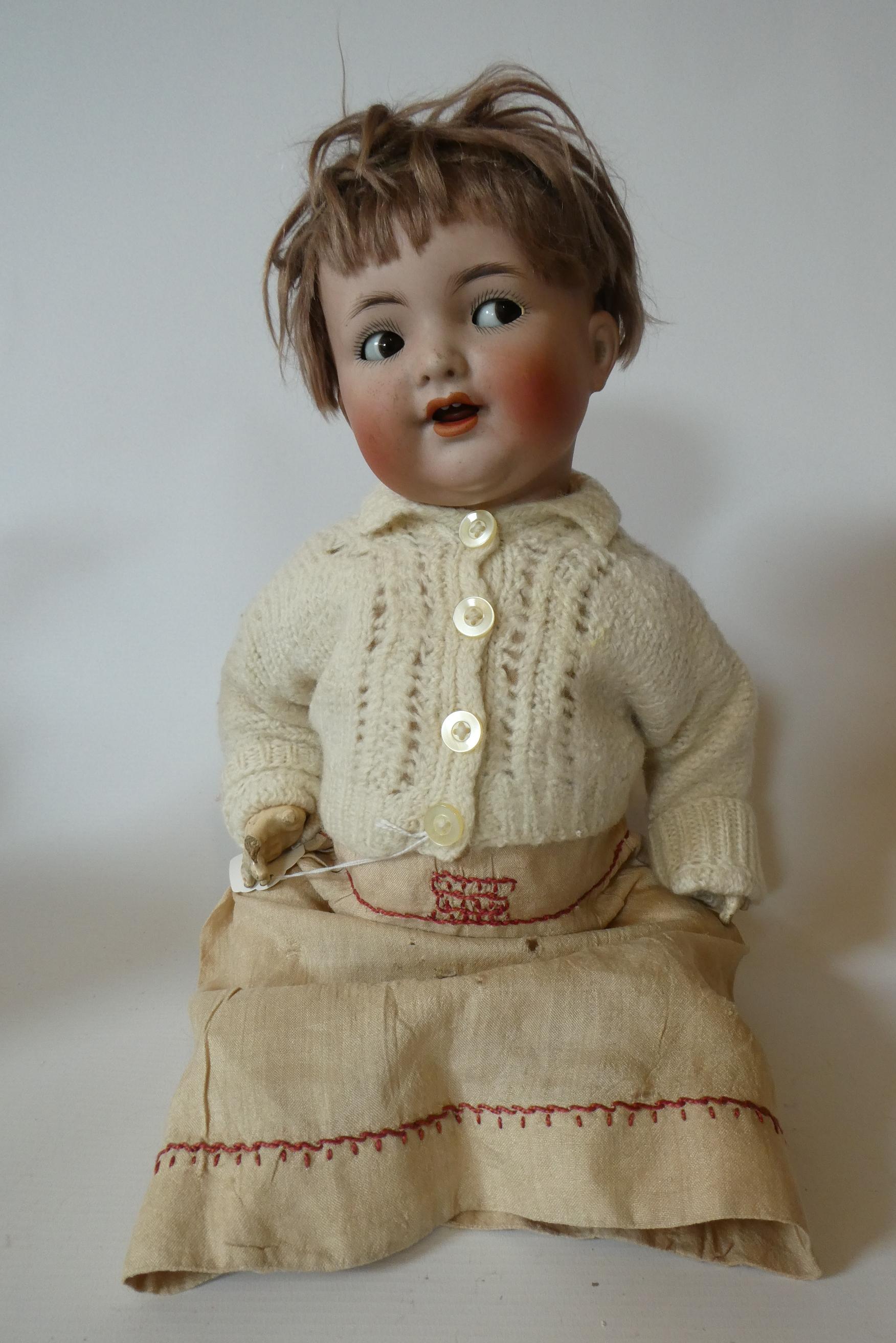 A Kammer & Reinhardt Halbig bisque socket head flirty doll Image