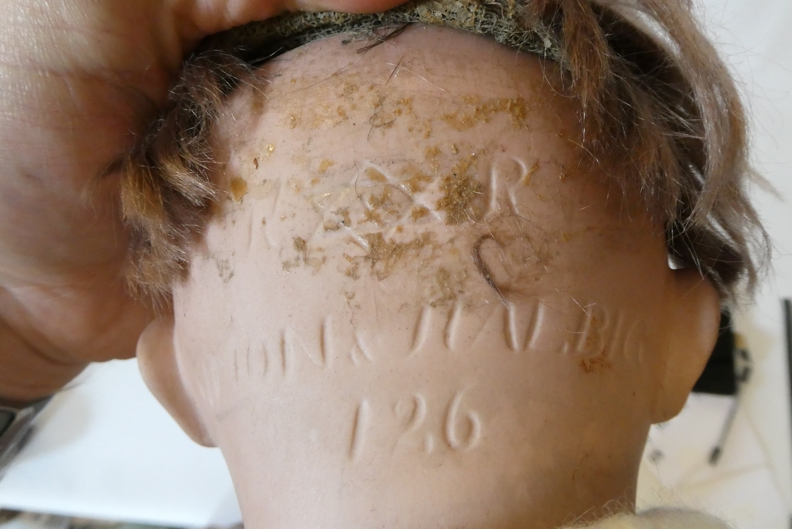 A Kammer & Reinhardt Halbig bisque socket head flirty doll Image