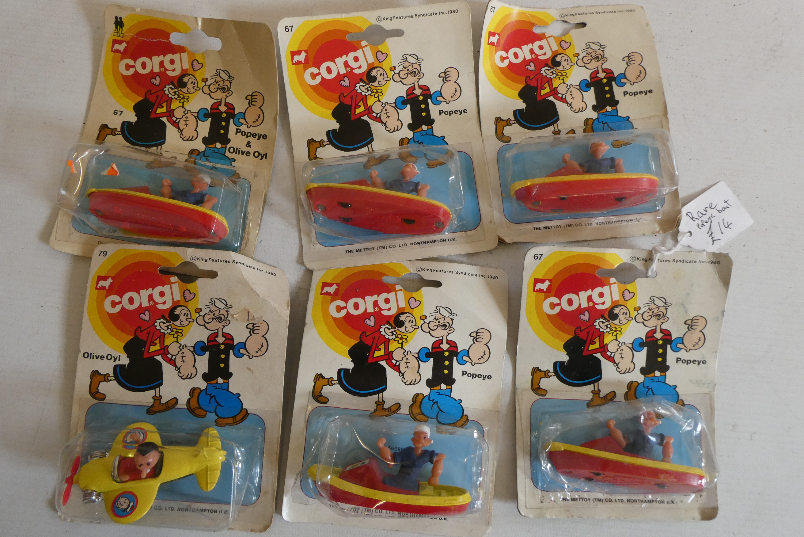 Corgi Popeye models comprising 5 x Popeye in boat and Olive Oyl in aeroplane, packing fair, models Image