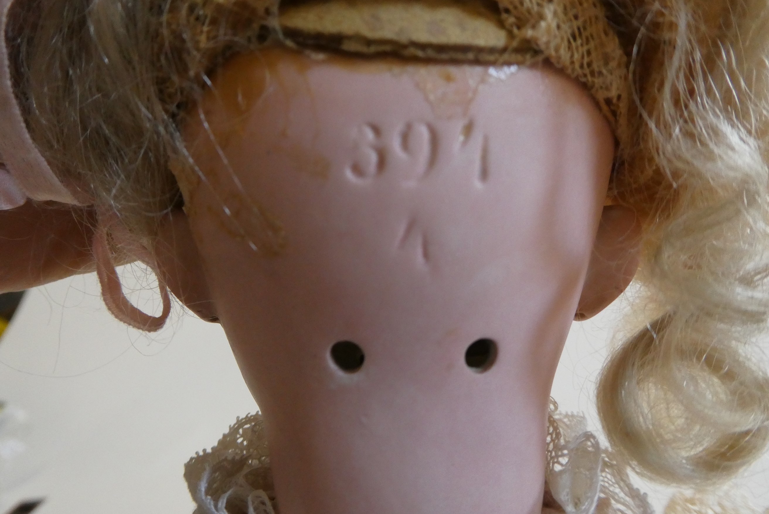 A Bahr & Proschild bisque socket head doll with blue glass sleeping eyes Image