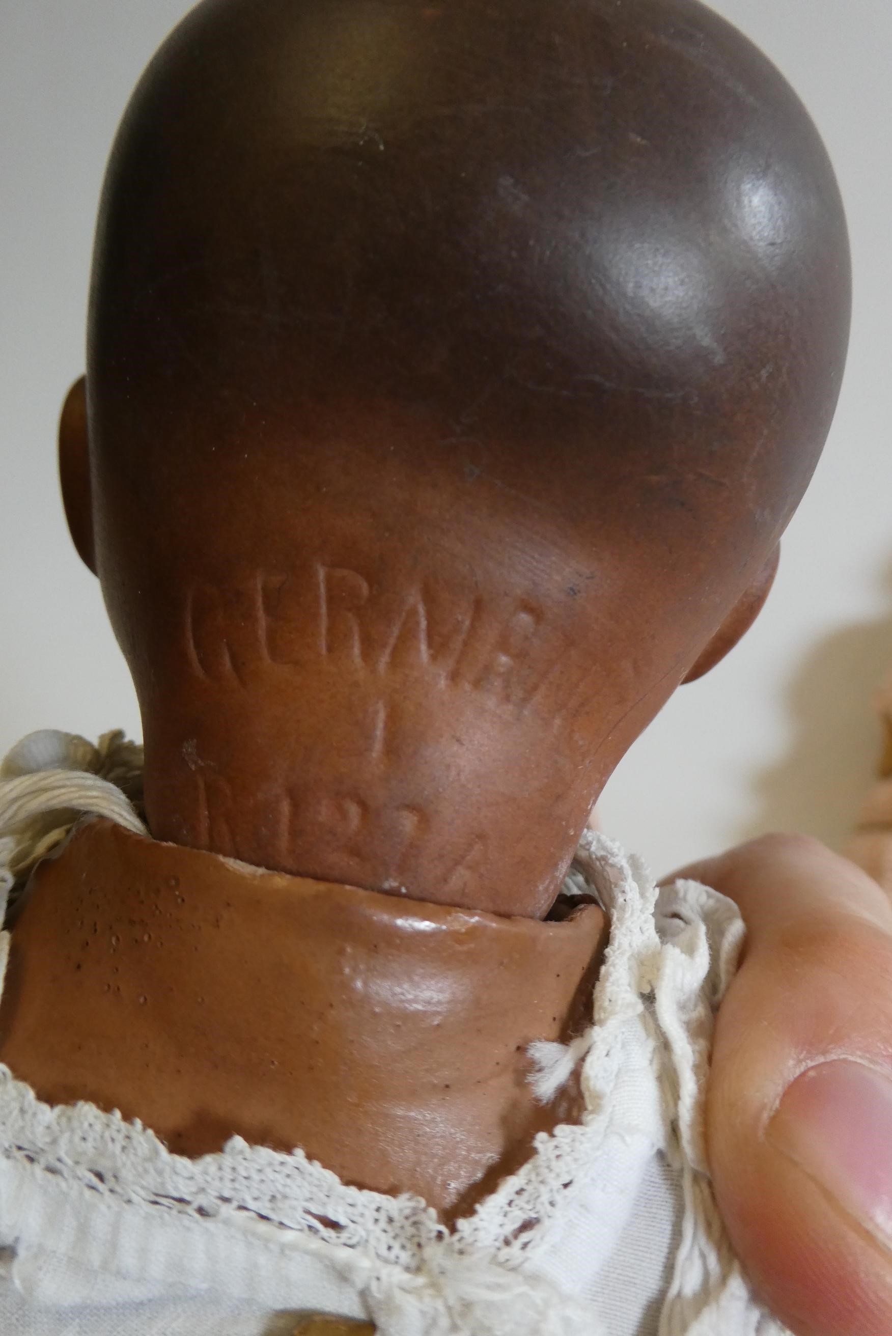 Three small bisque socket head dolls Image