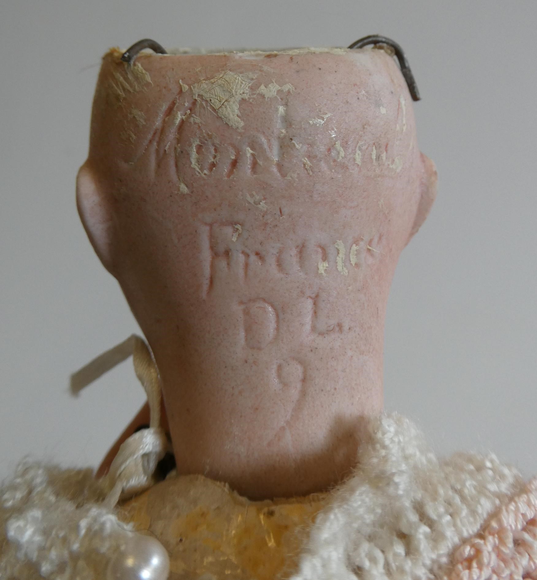 Three small bisque socket head dolls Image