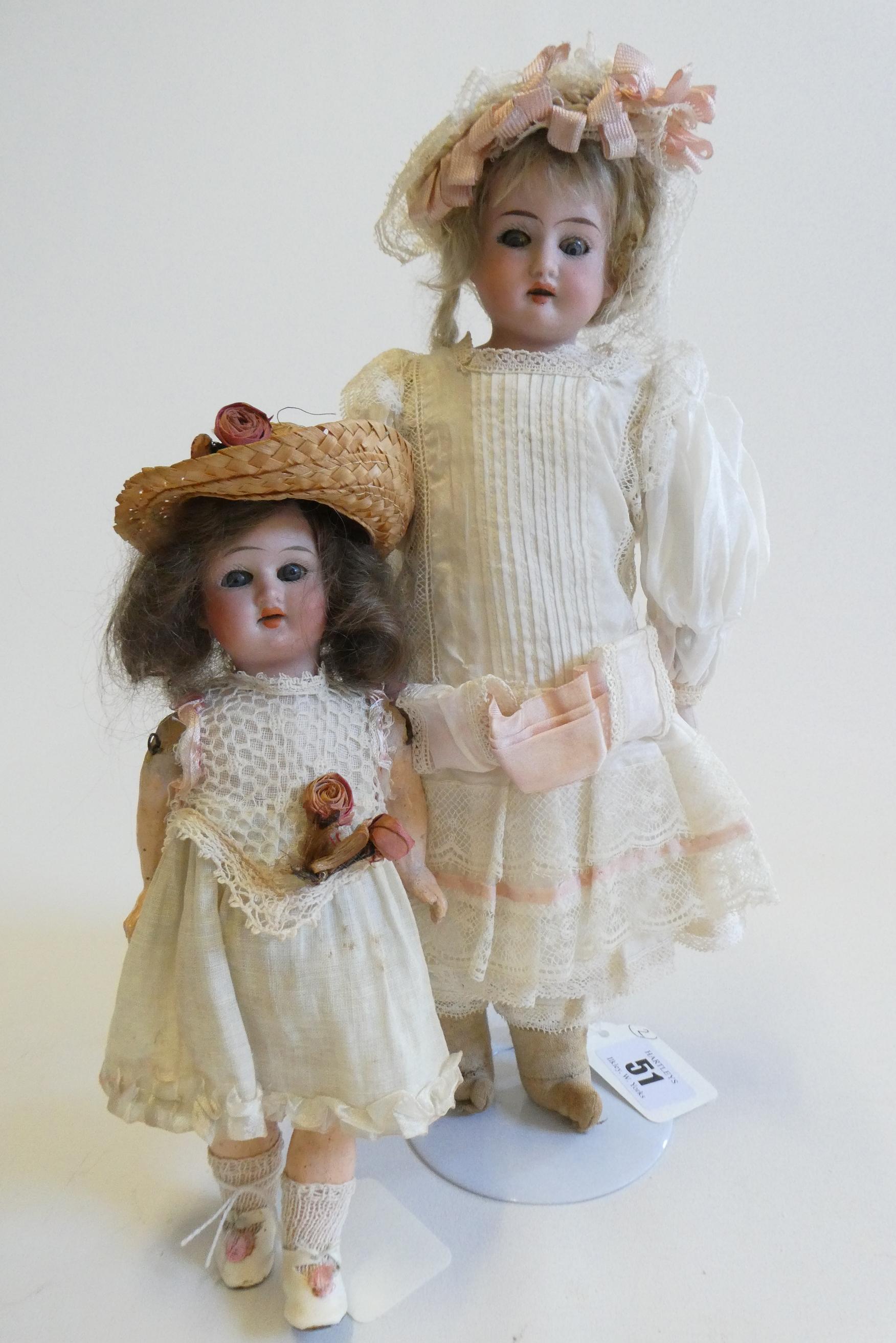 Two German bisque head dolls Image