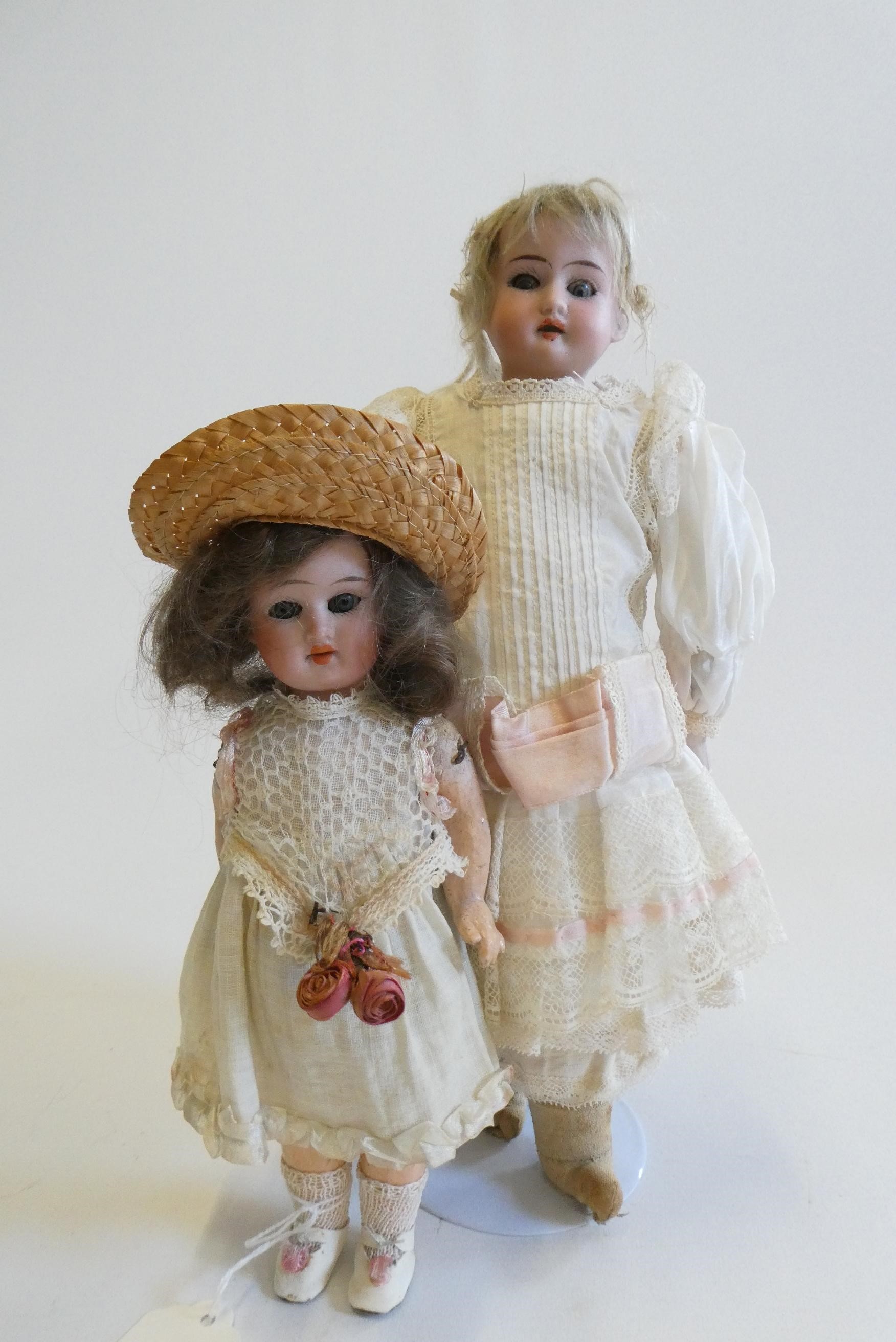 Two German bisque head dolls Image