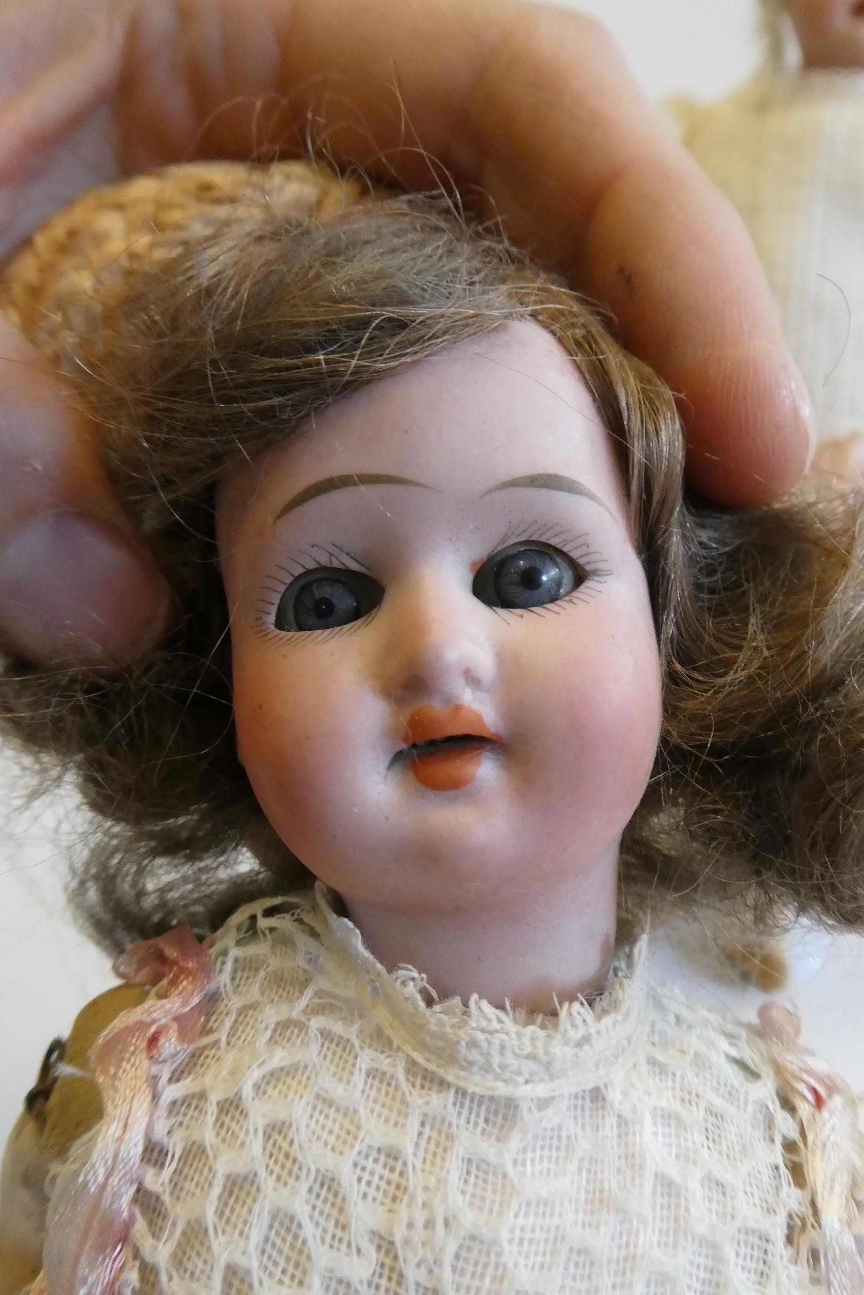 Two German bisque head dolls Image