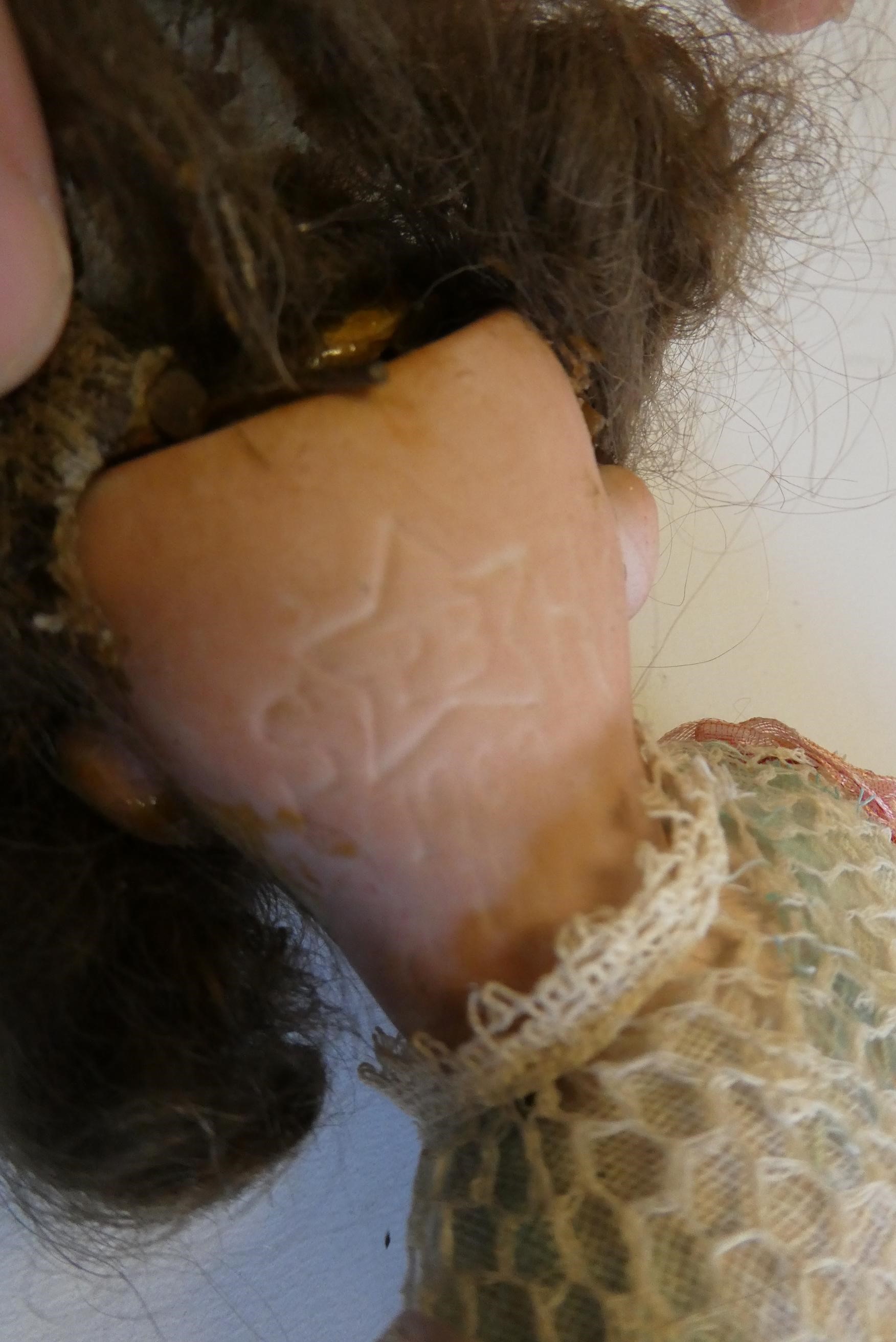 Two German bisque head dolls Image