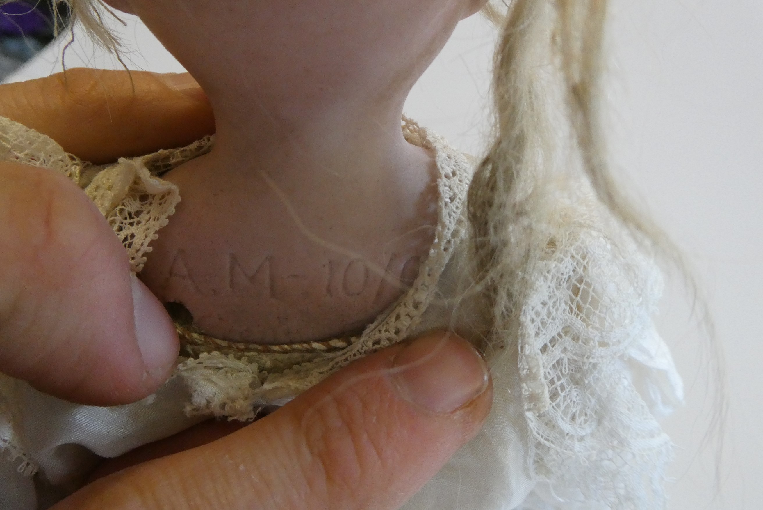 Two German bisque head dolls Image