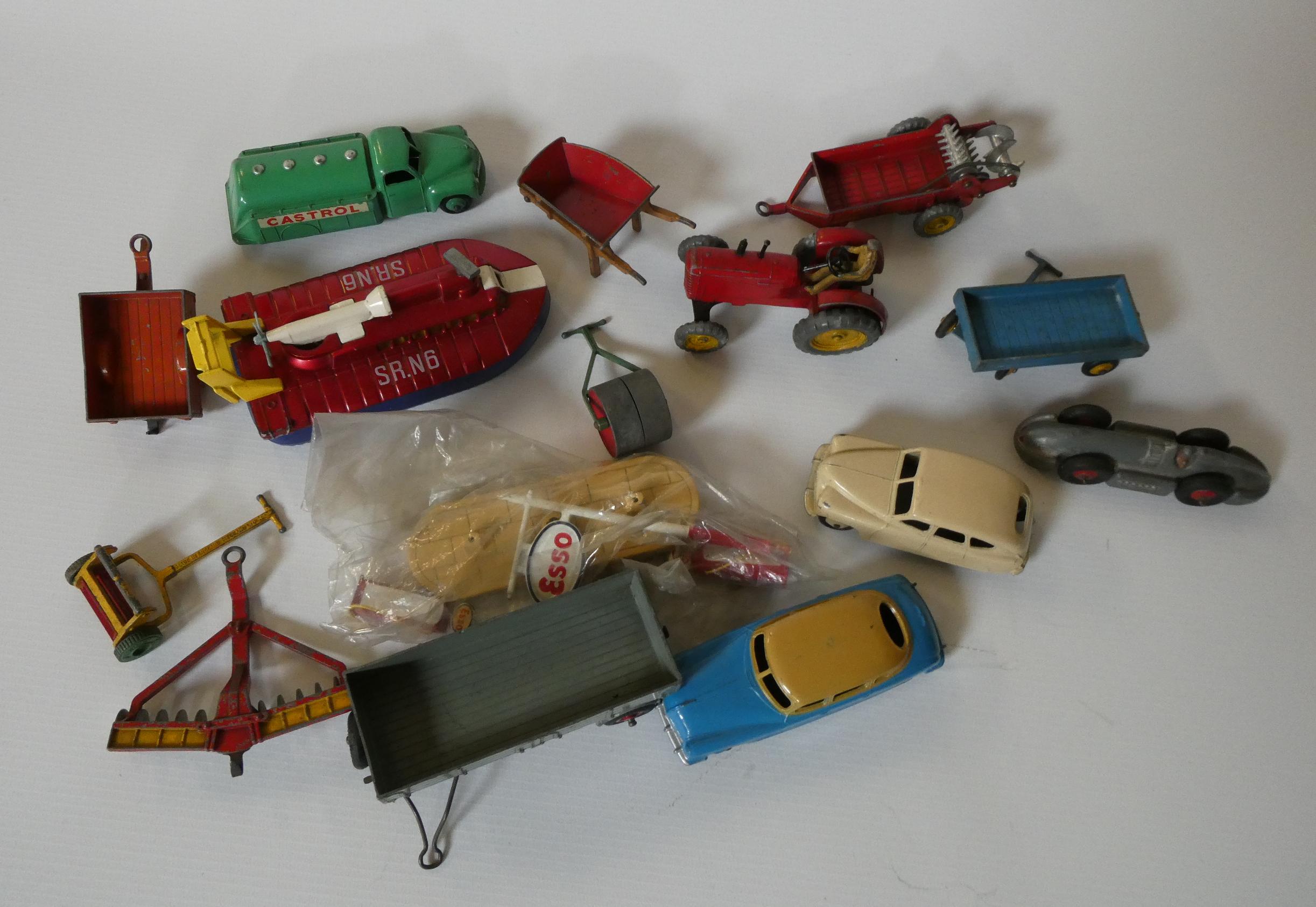 Unboxed Dinky vehicles including farm equipment, cars and tanker lorry, fair to good (Est. plus 24% Image