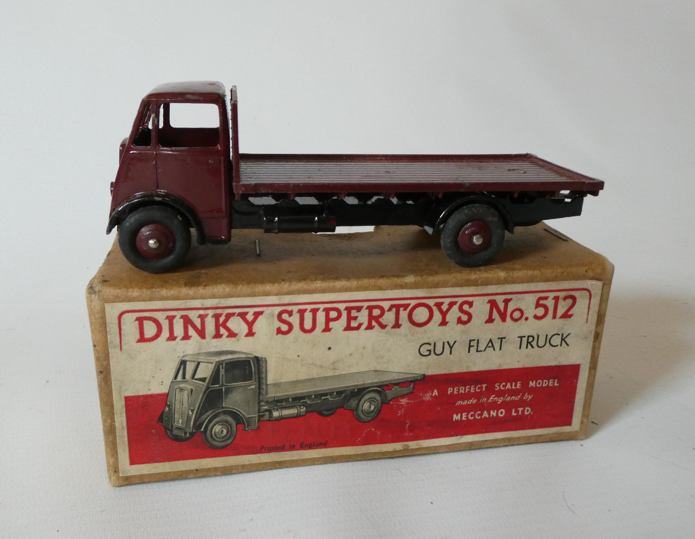 Dinky Super Toys 512 guy flat truck in maroon, boxed, fair to good (Est. plus 24% premium inc. VAT) Image