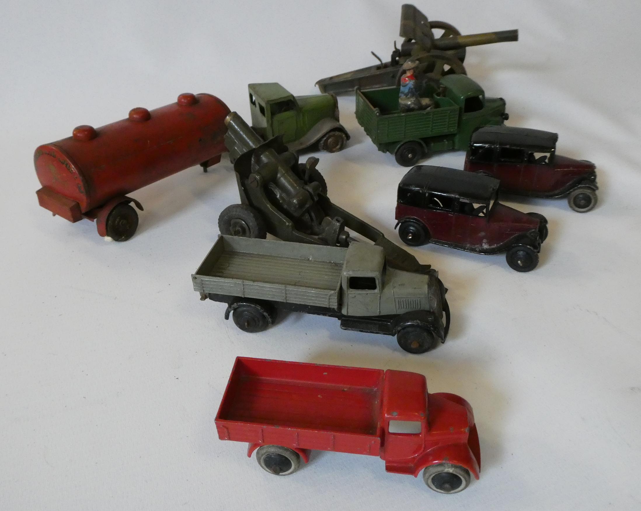 Pre war Dinky vehicles comprising two trucks and two taxis, a Dinky Bedford truck, Minic clockwork Image