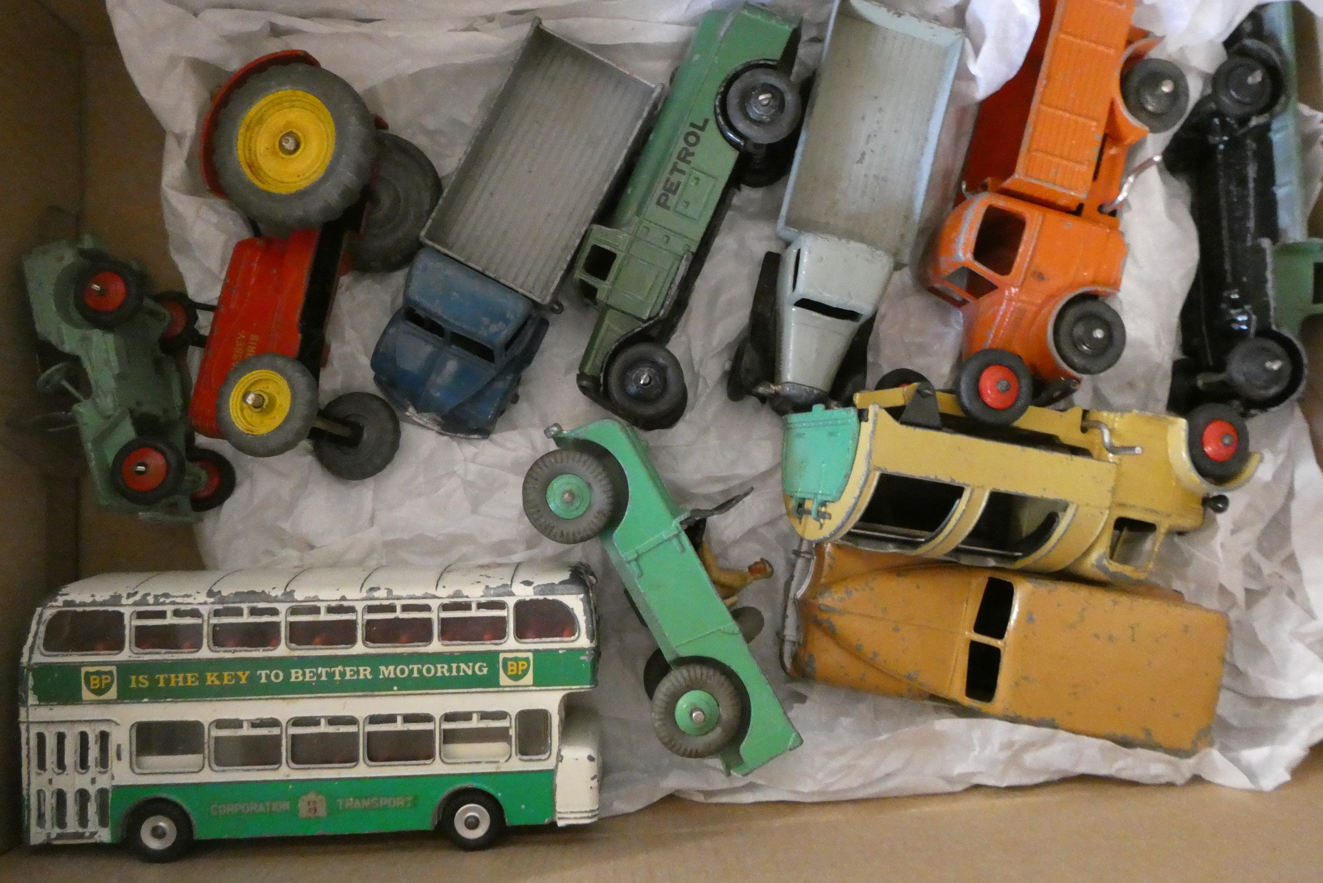 Unboxed playworn Dinky vehicles including trucks, saloon cars and tractor and The Great Book of Image