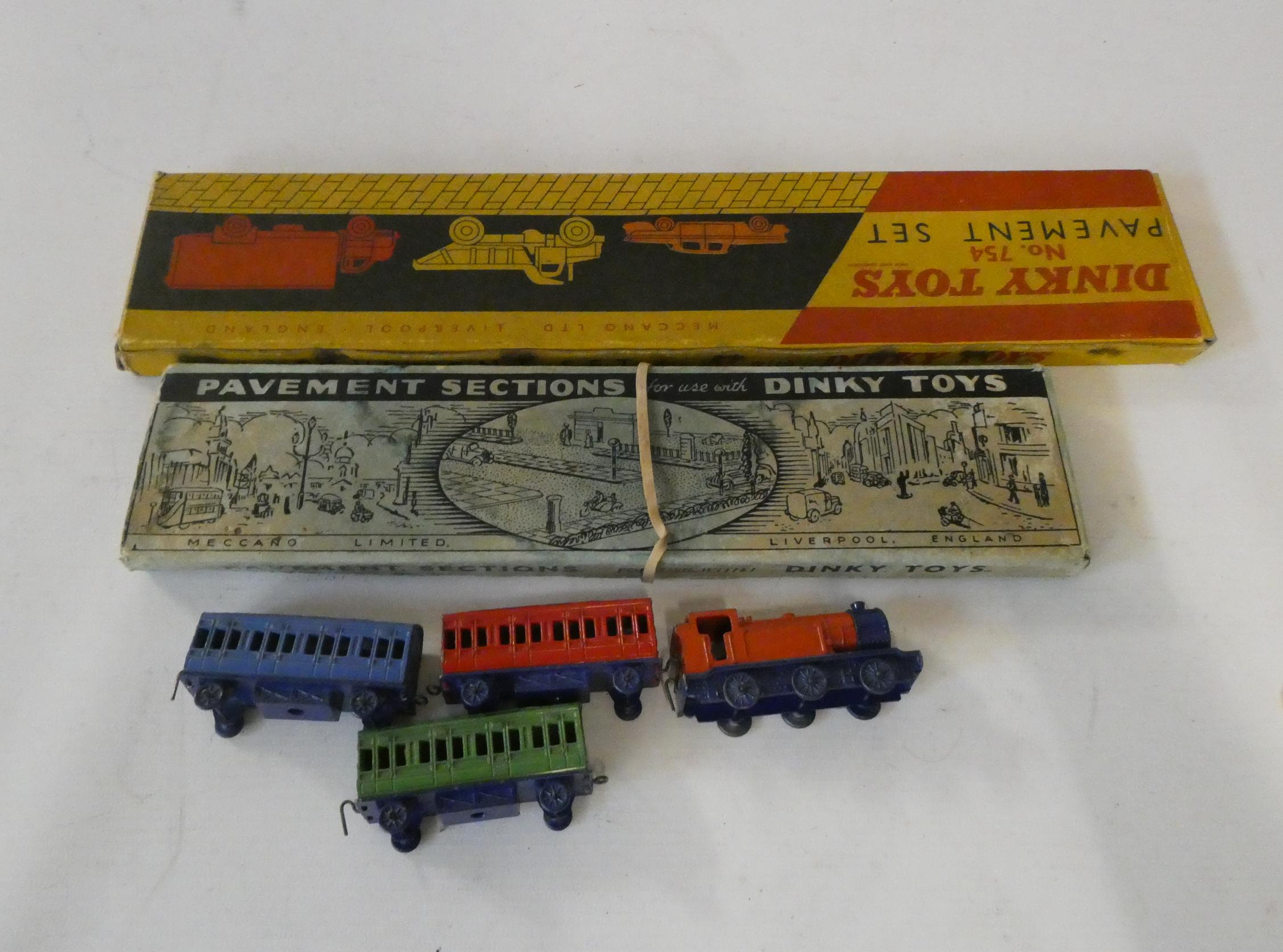Dinky diecast train with locomotive and three coaches and two boxed sets of Dinky pavement pieces, Image