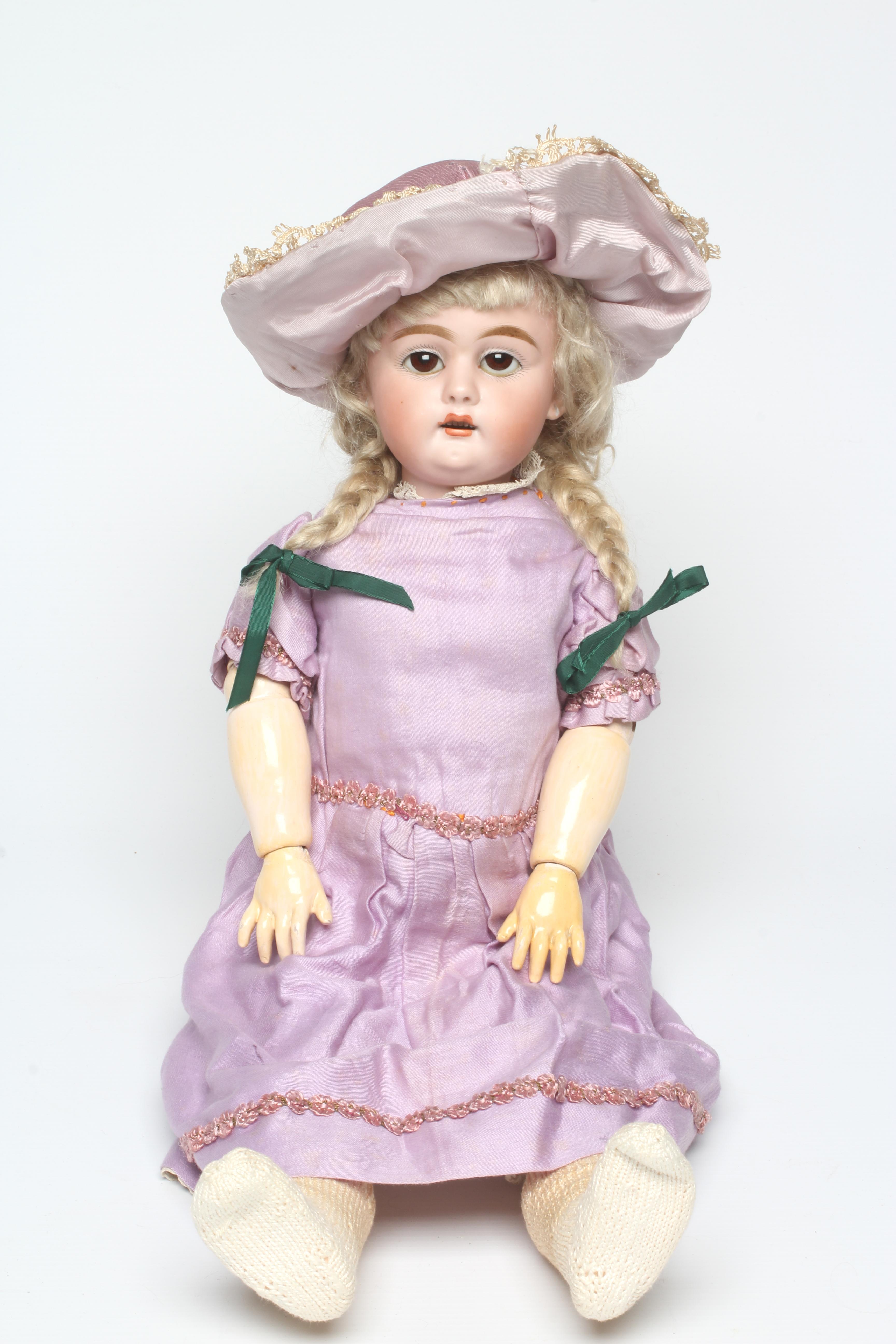 A bisque socket head doll Image