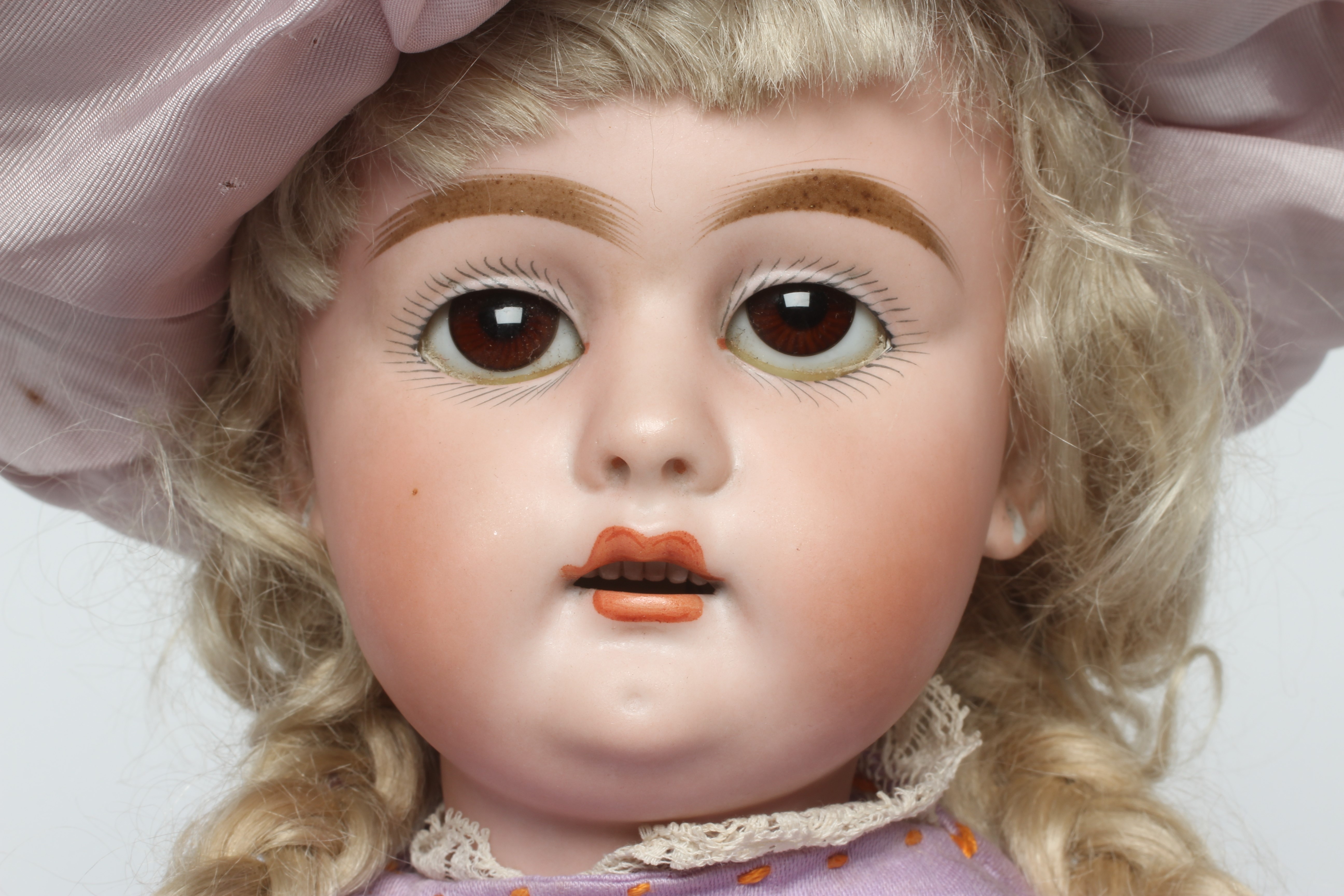A bisque socket head doll Image