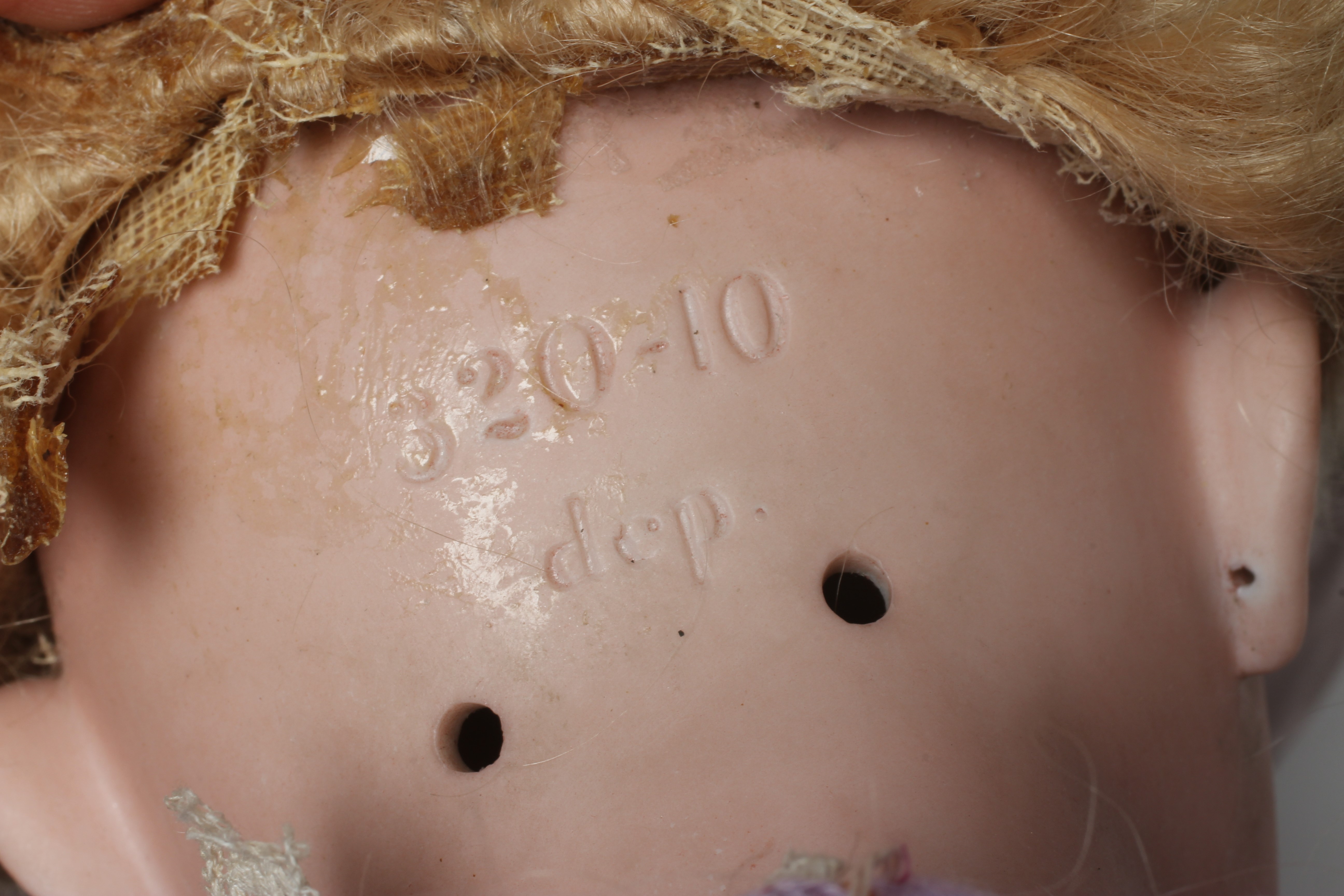 A bisque socket head doll Image