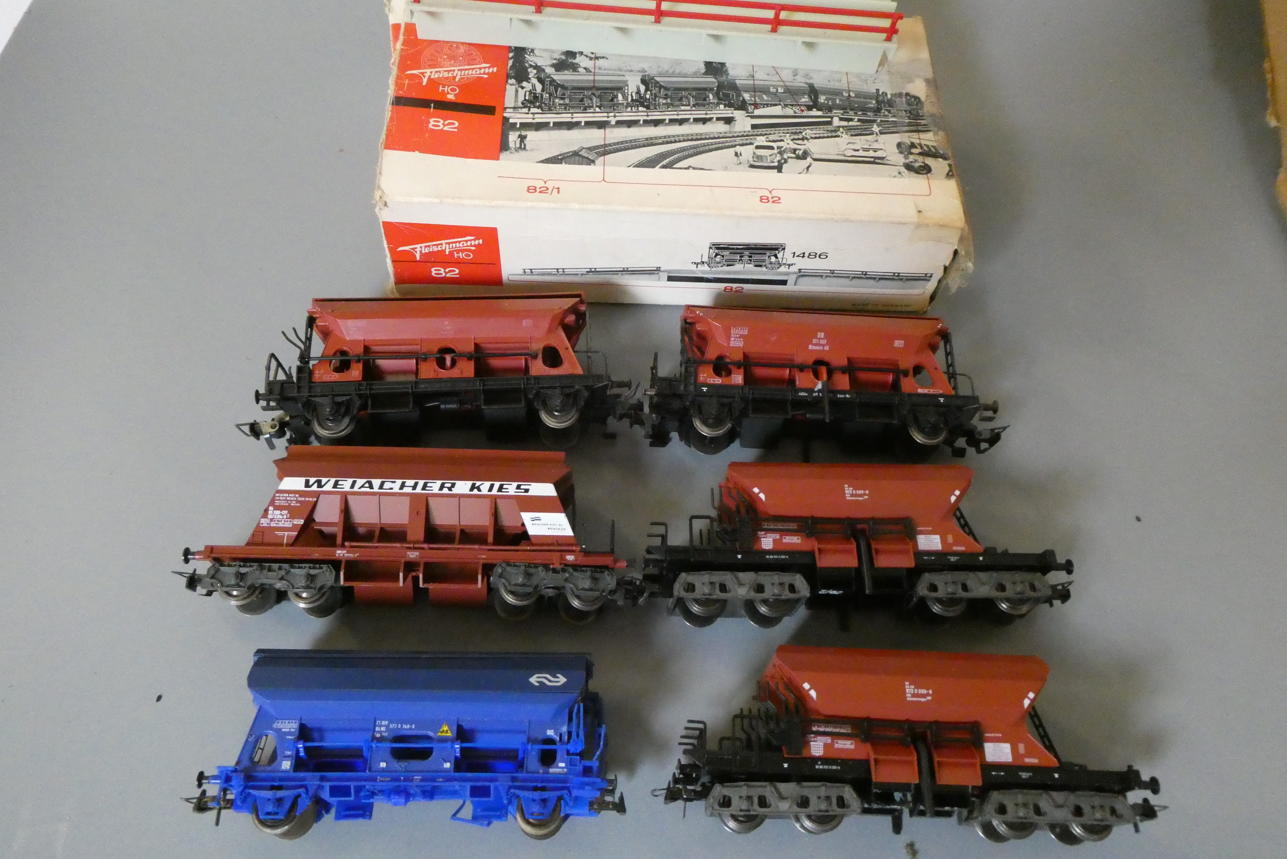 Six unboxed H0 scale DB call Hopper wagons by Fleischmann and others and a Fleischmann Hopper Image