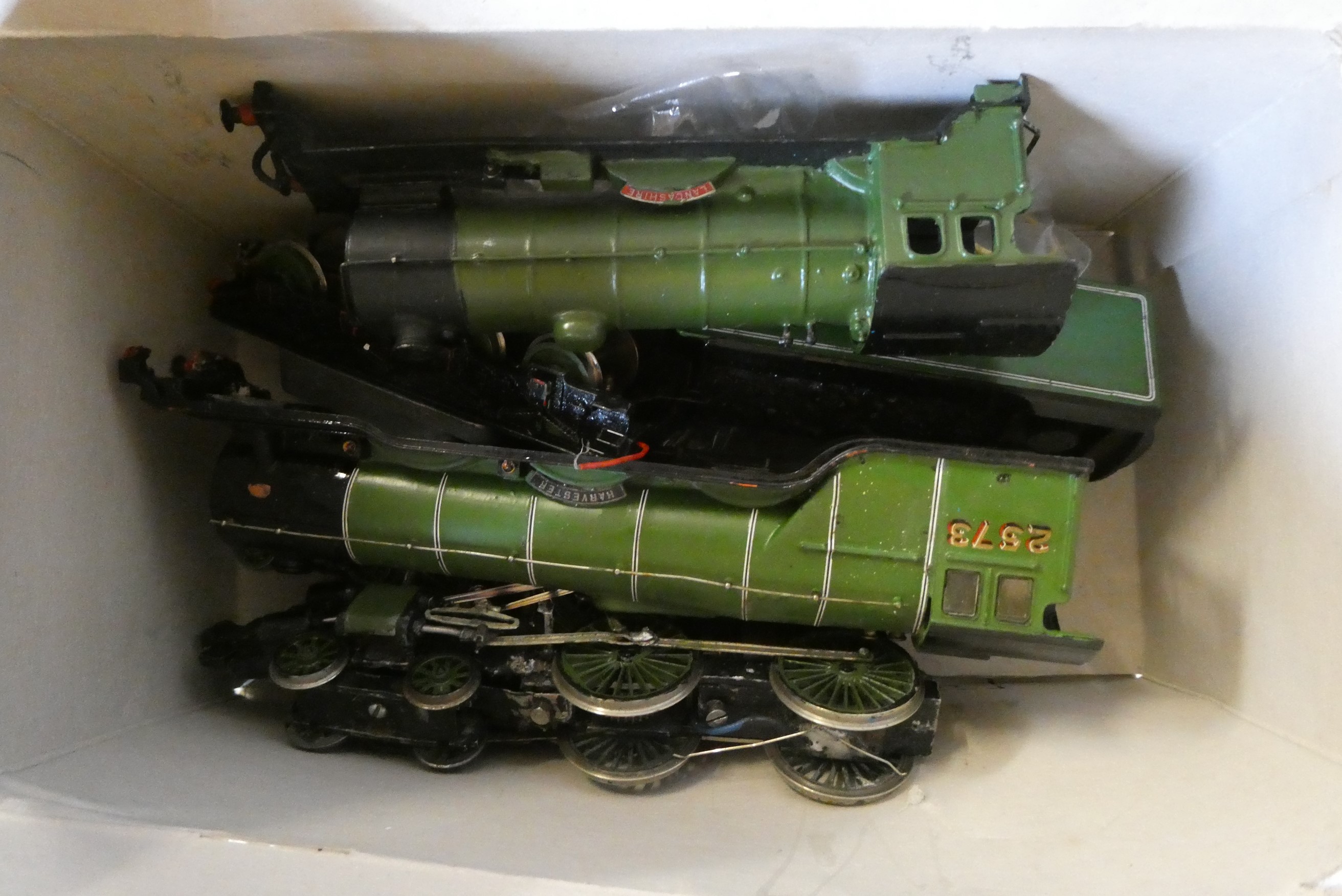 Seven 00 gauge unboxed locomotives including tank engines and tender locomotives, some items have Image